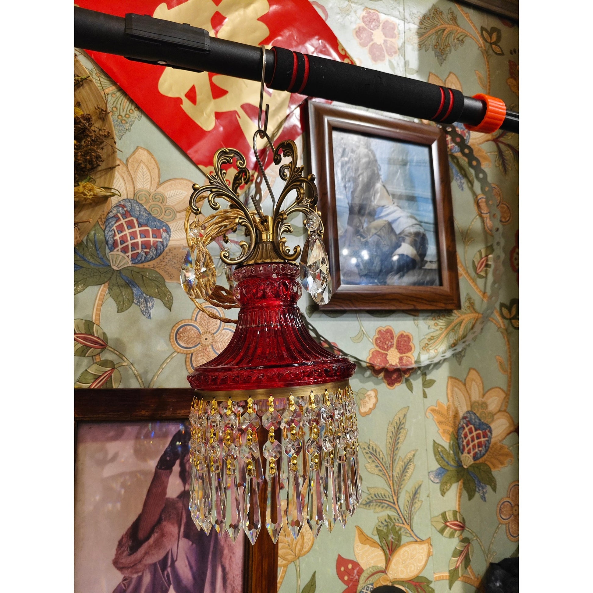 Lifestyle image featuring the pendant lamp in a cozy reading nook.