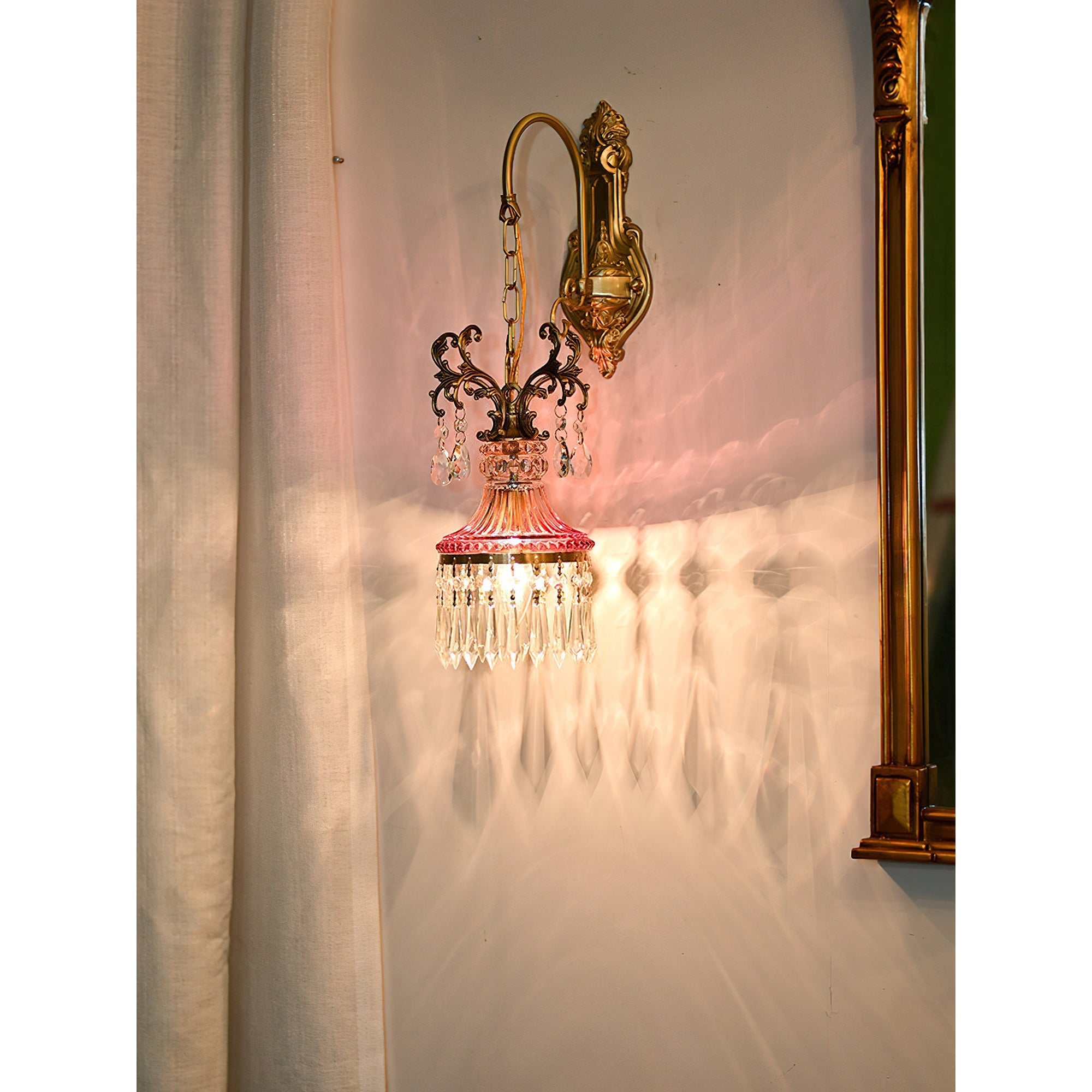 Angled view of the orange crystal wall lamp.