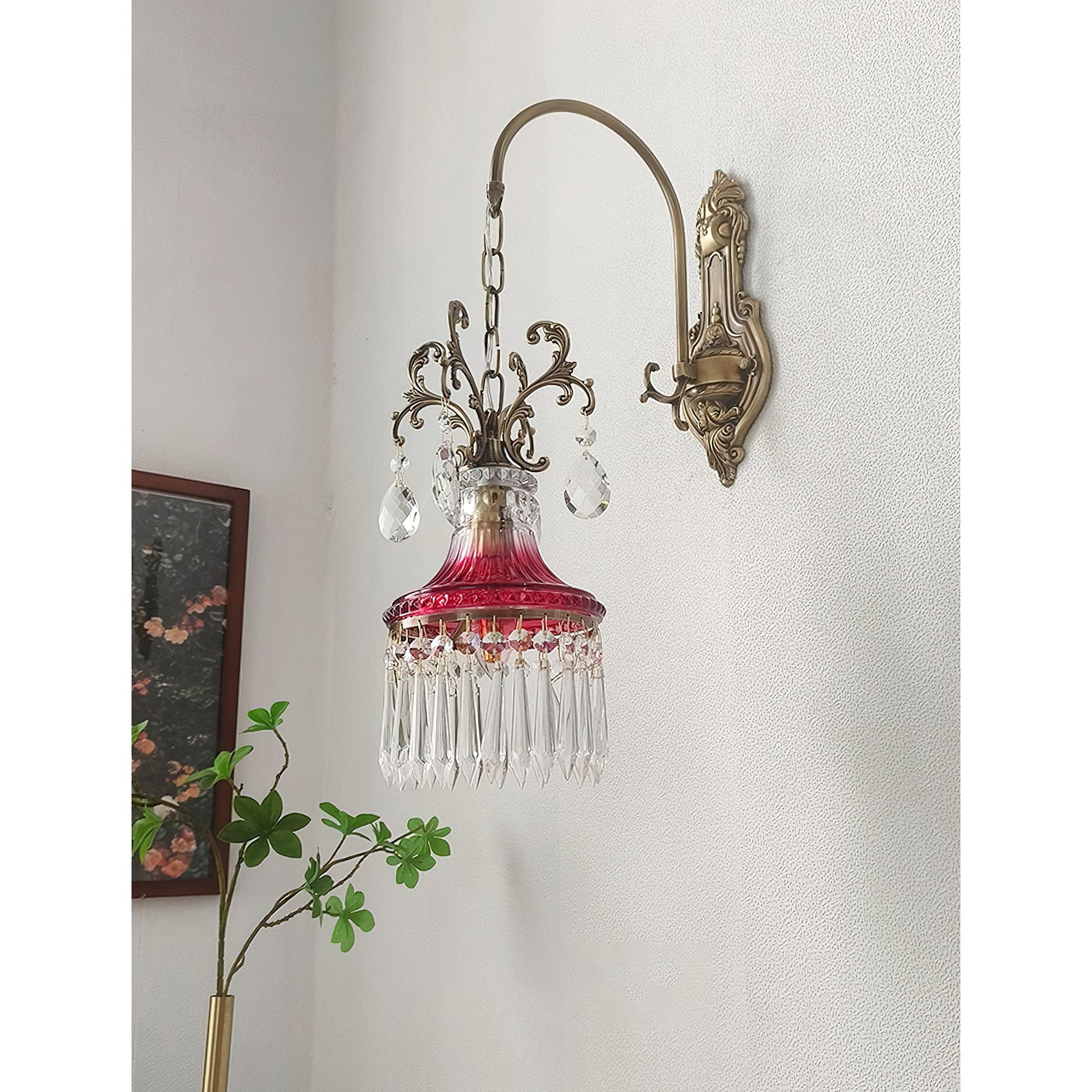 The ornate filigree detail on the lamp's crown.