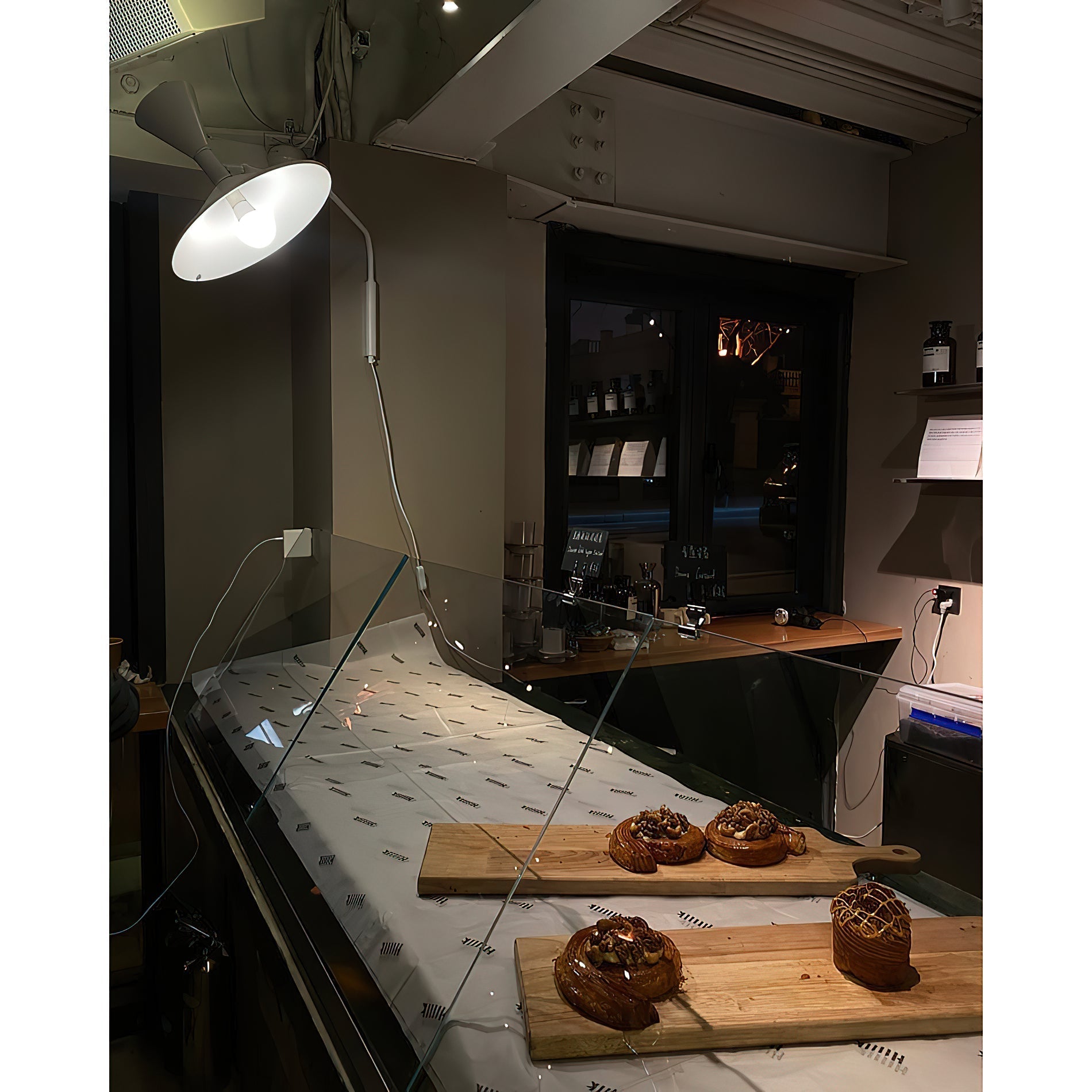 The sconce folded compactly against the wall to save space.