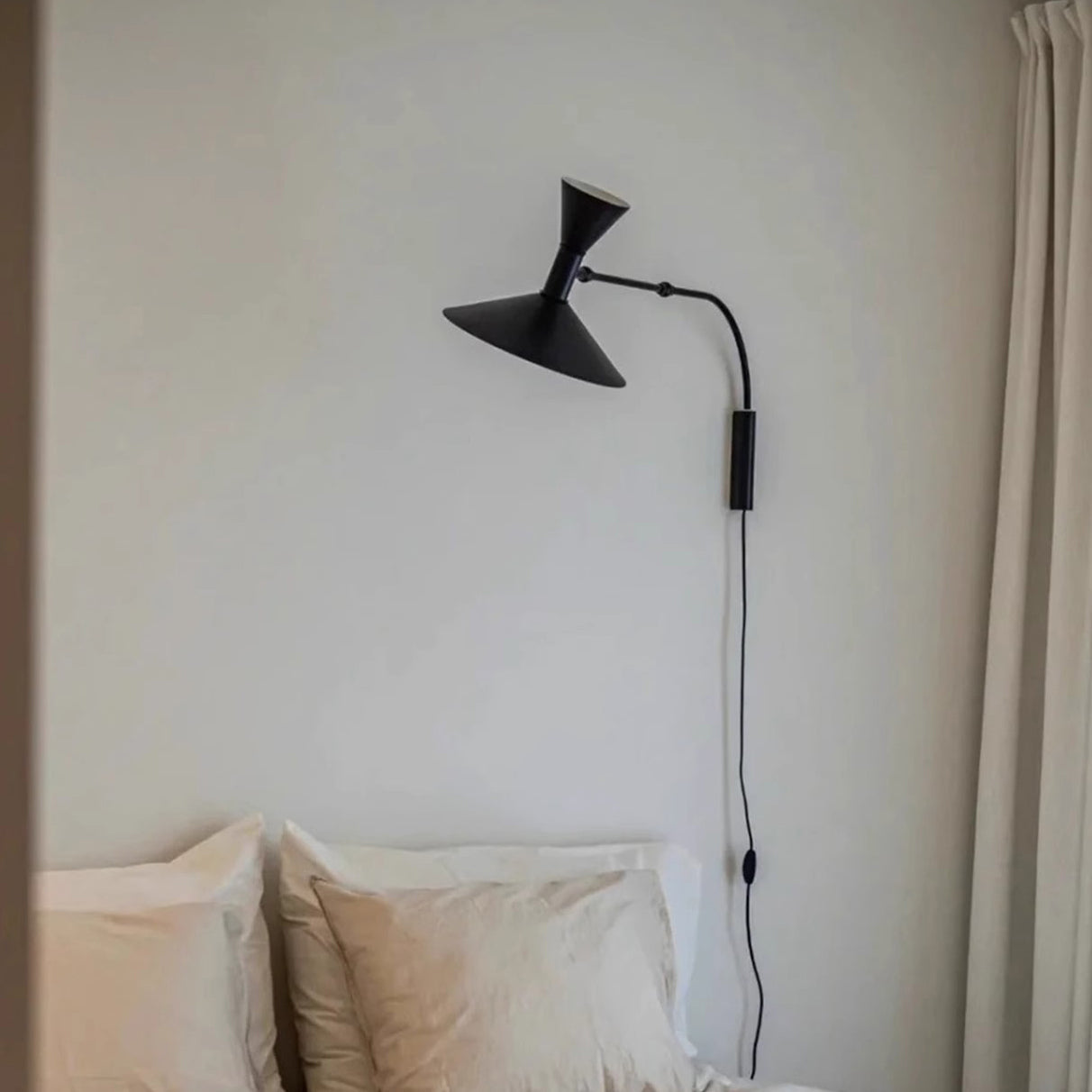 Marseille Swing Arm Plug-in Sconce in white finish.