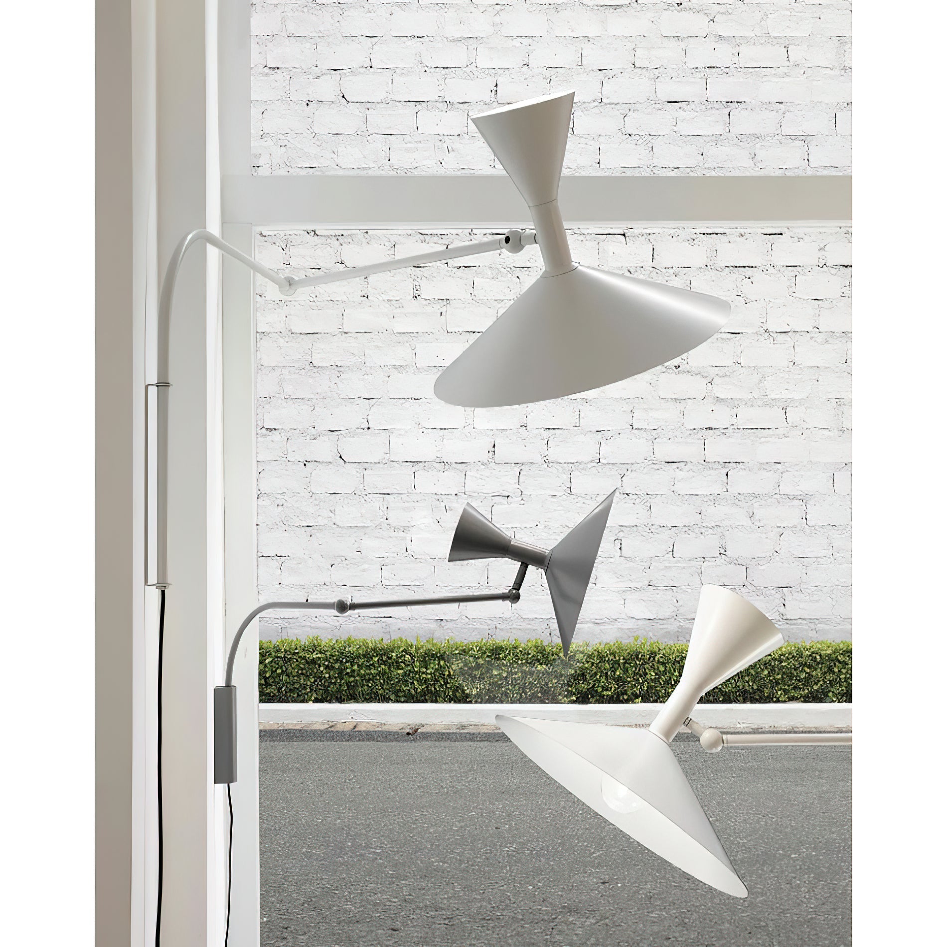 Marseille Swing Arm Plug-in Sconce in grey finish.