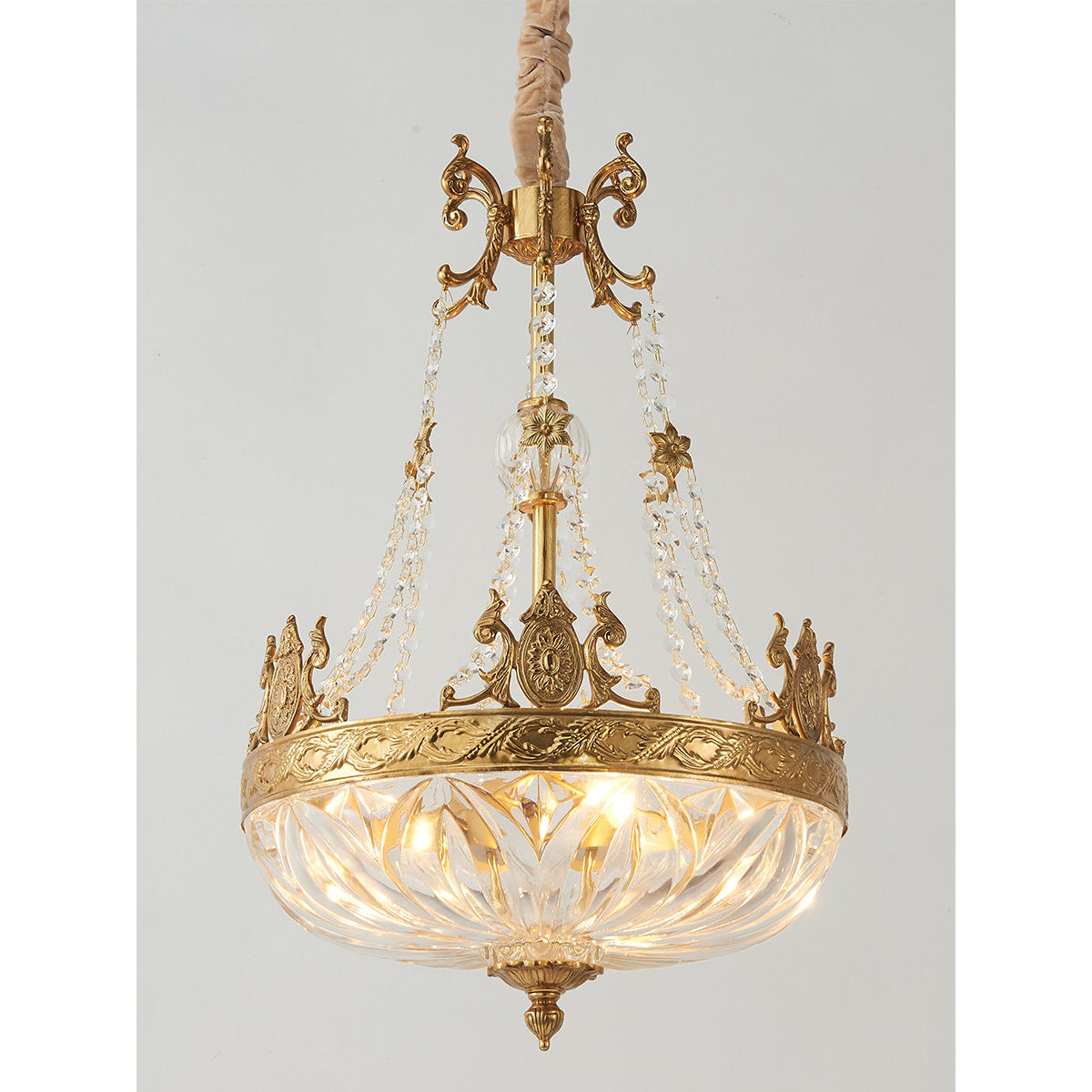 Marselle Chandelier hanging over a formal dining table.