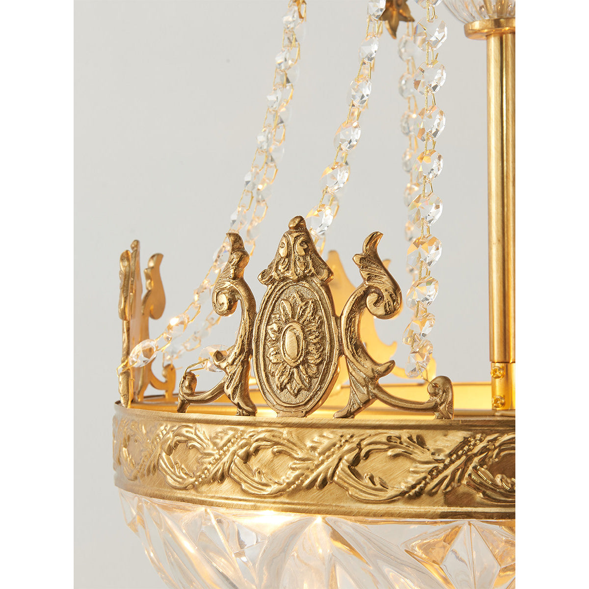 The full chandelier with its adjustable hanging chain and canopy.