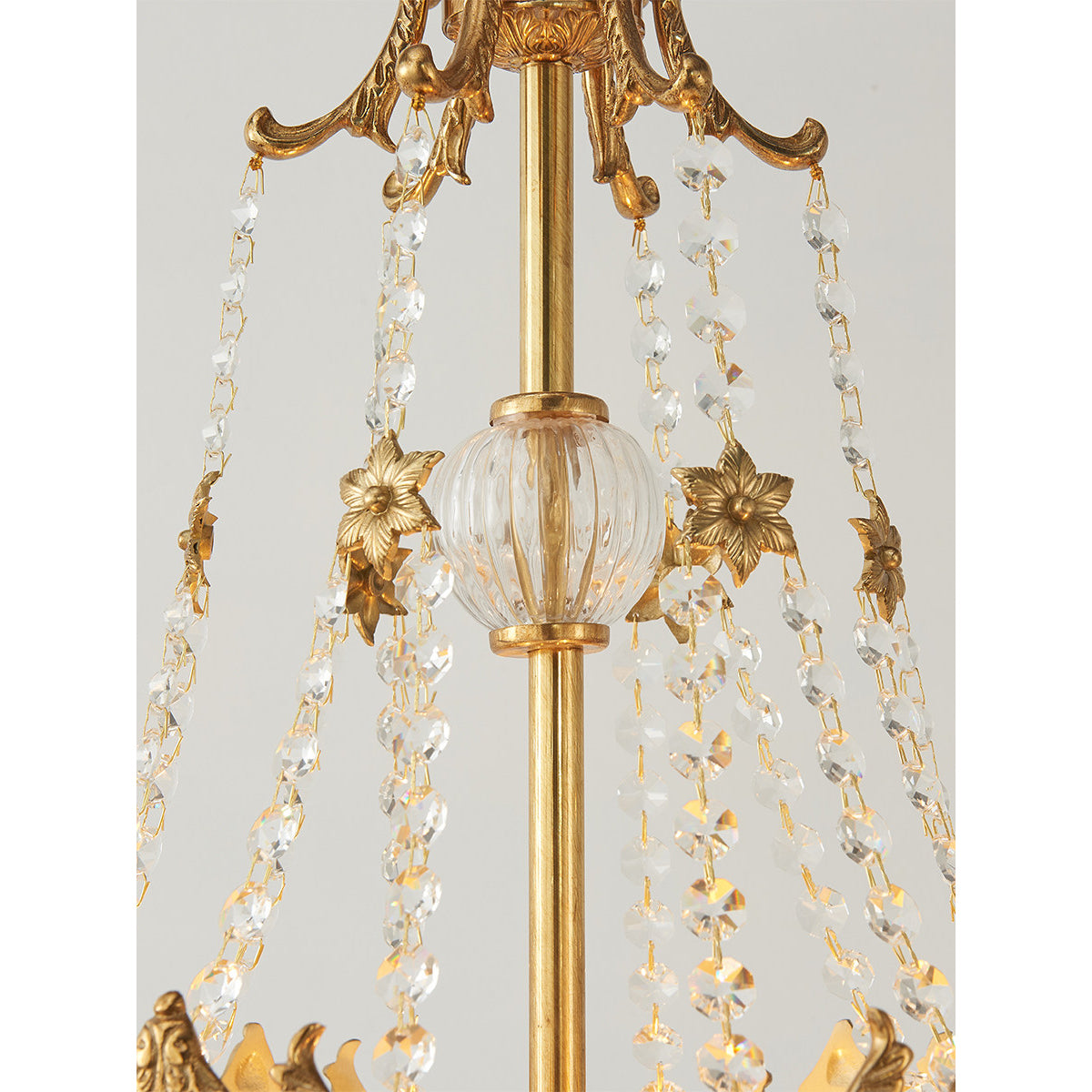 Marselle Chandelier in a neoclassical interior with high ceilings.