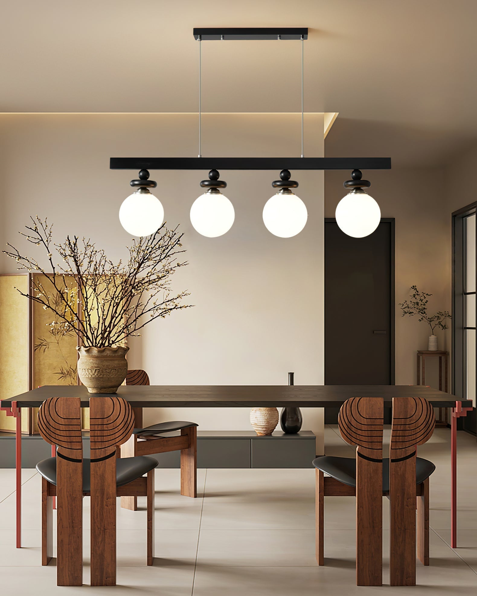 A single Maru Pendant Light illuminating a cozy living room corner.