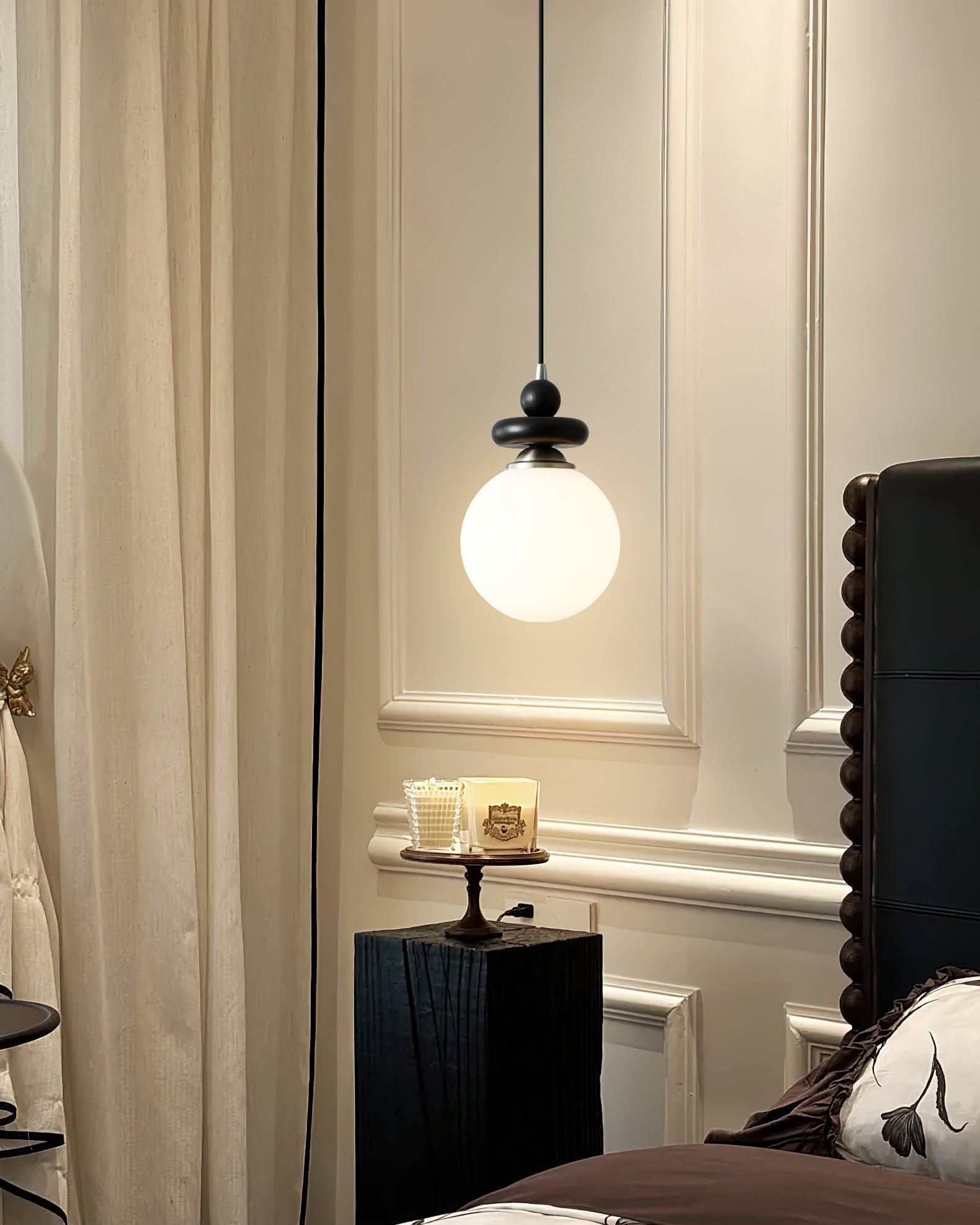 Lifestyle image featuring the Maru Pendant Light in a minimalist kitchen.