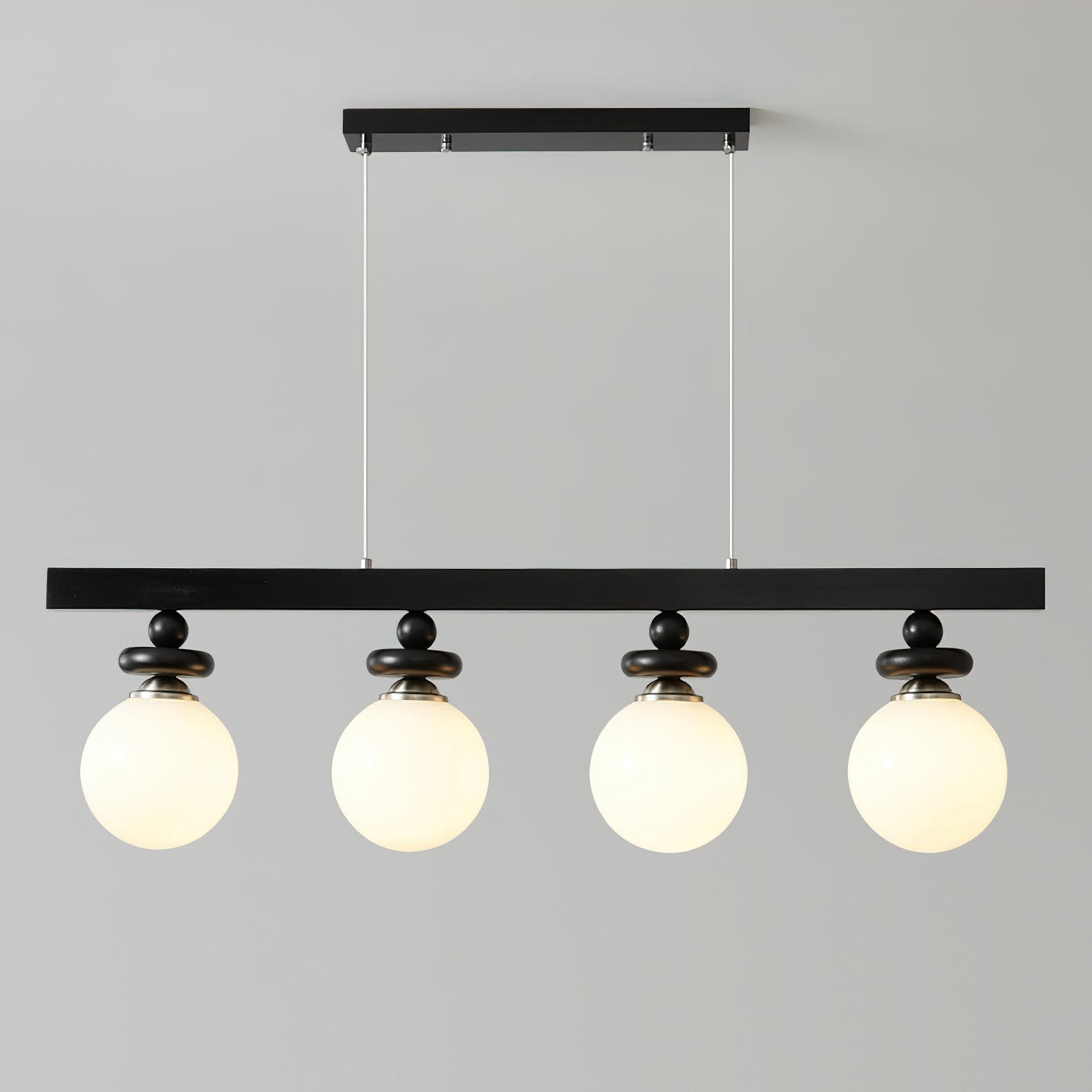 Full product shot of the single Maru Pendant Light on a white background.