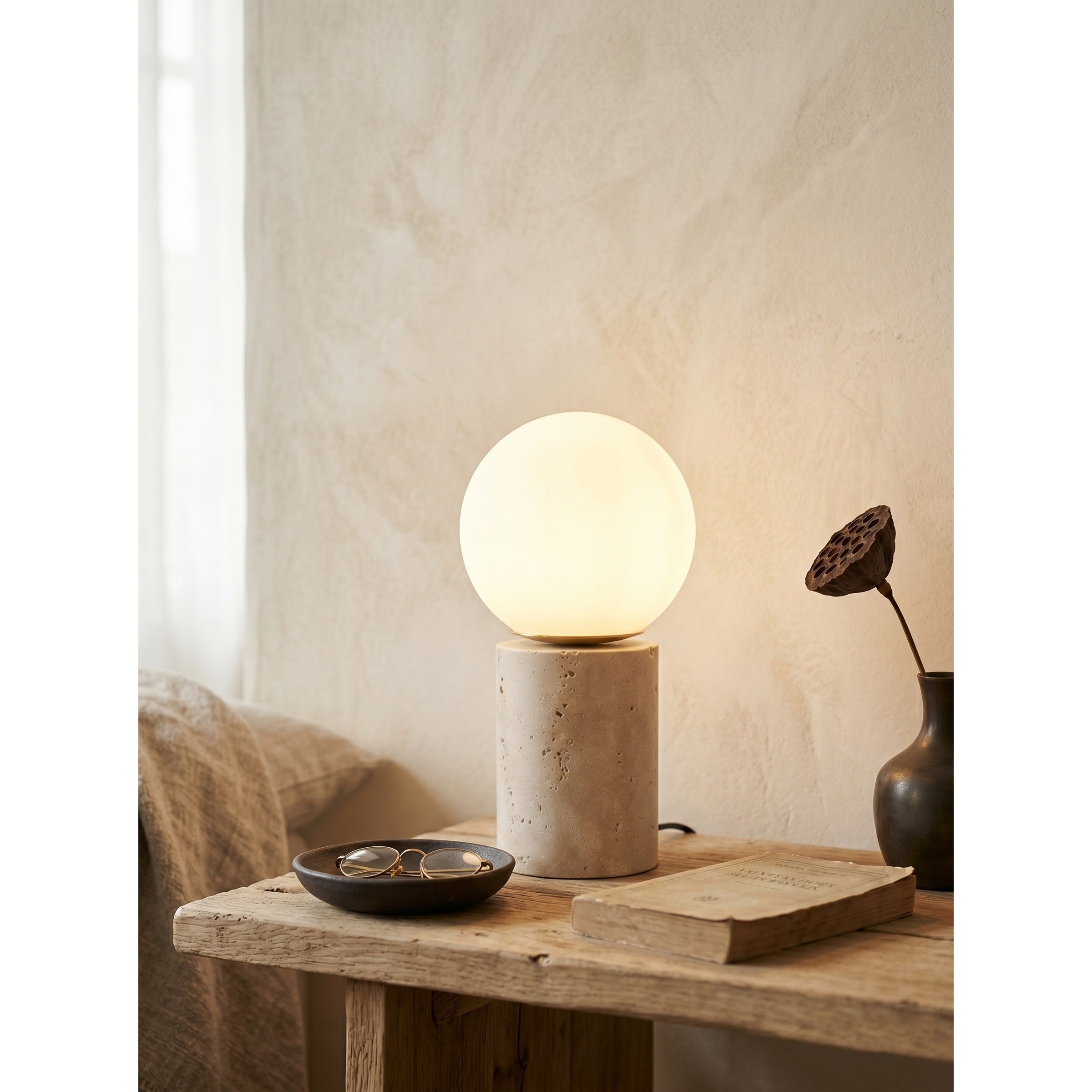 The lamp against a dark background to emphasize its warm glow.