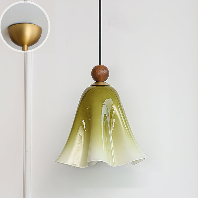 The Meblo Pendant Light shown against a dark background to highlight its form.