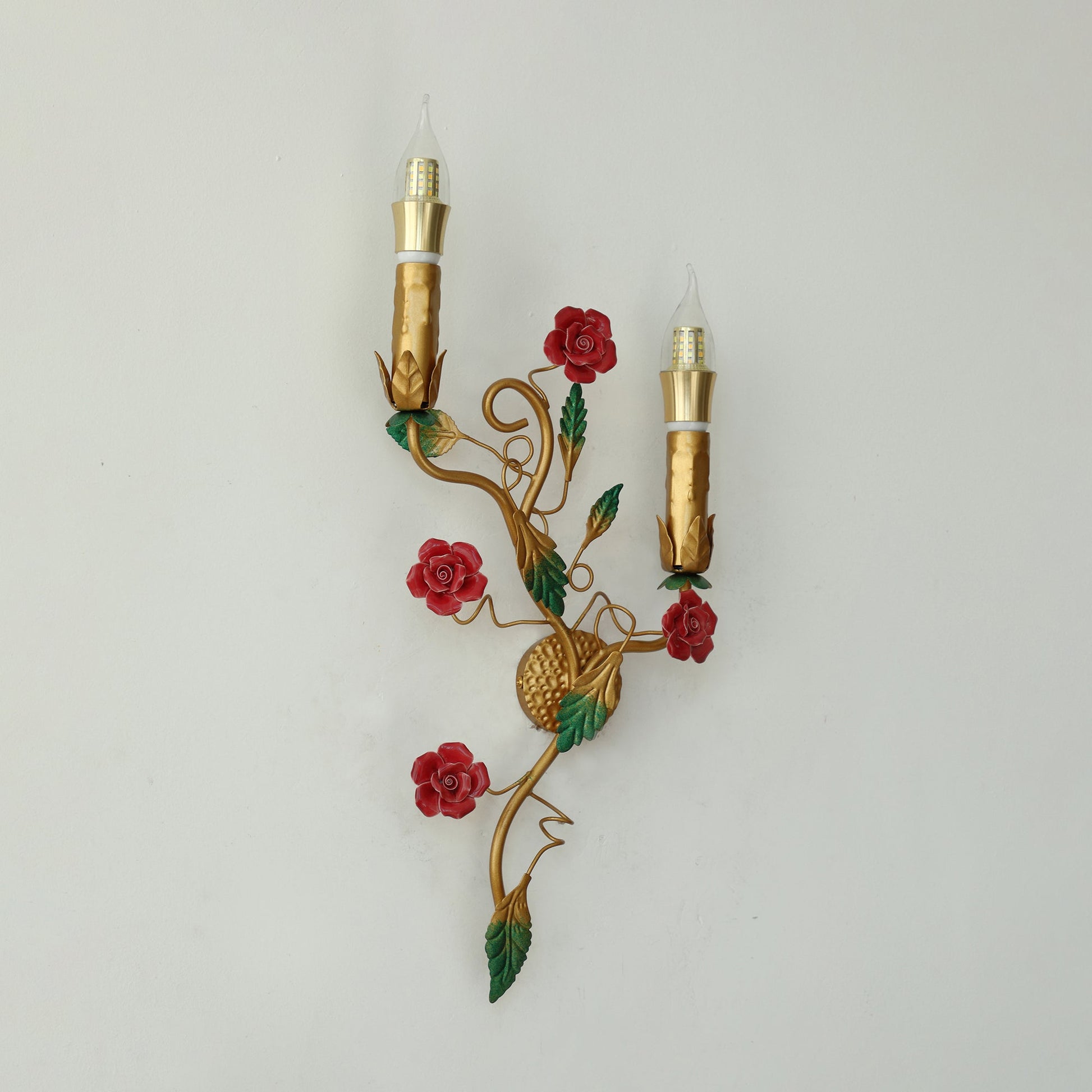 Detailed shot of the metalwork and ceramic flower.