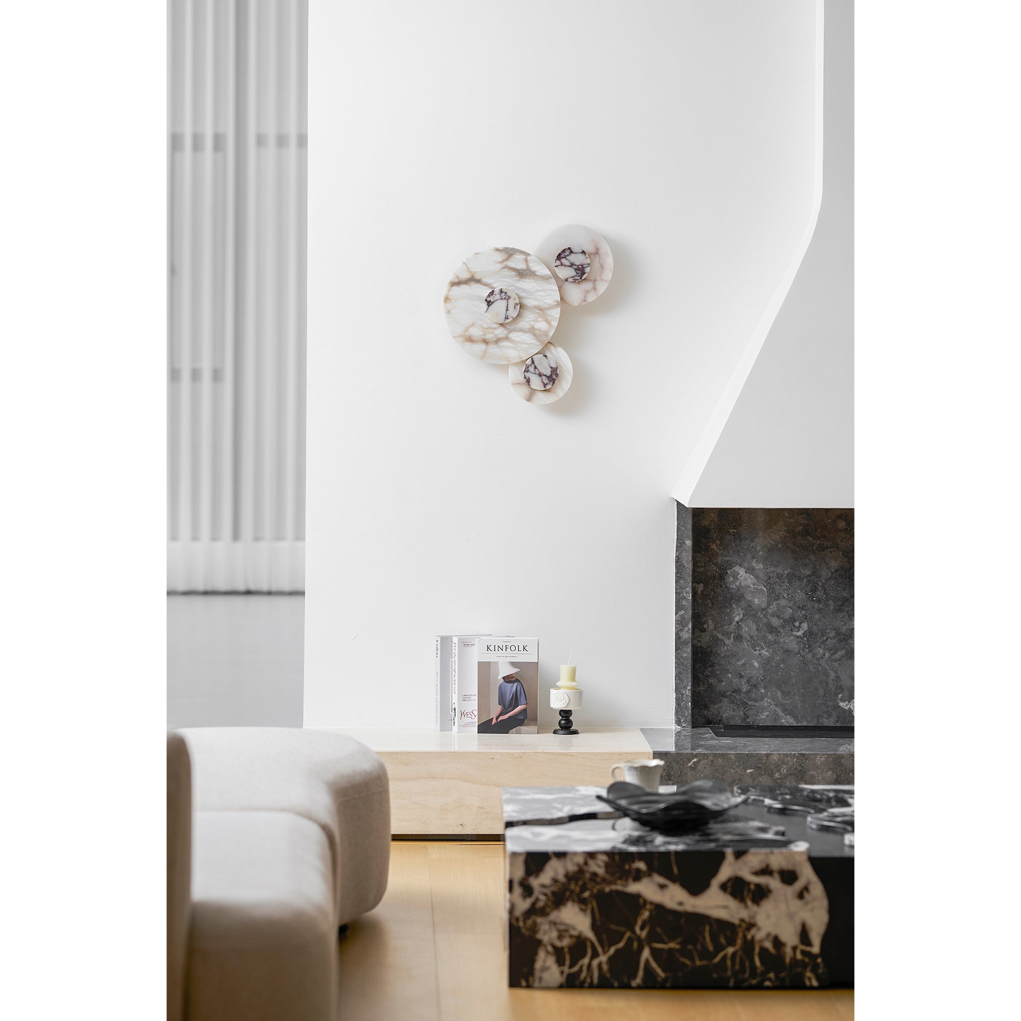 The Median Wall Lamp against a dark wall to show contrast.