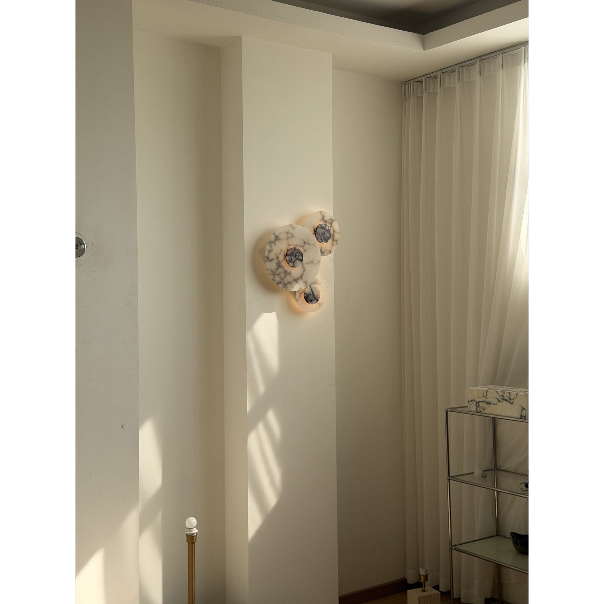Median Wall Lamp used as an accent light in a hallway.