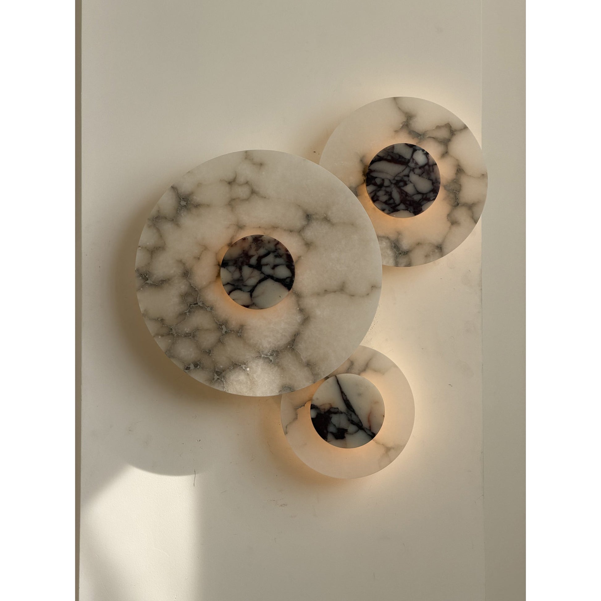 Another angle of the white alabaster lamp showcasing its form.
