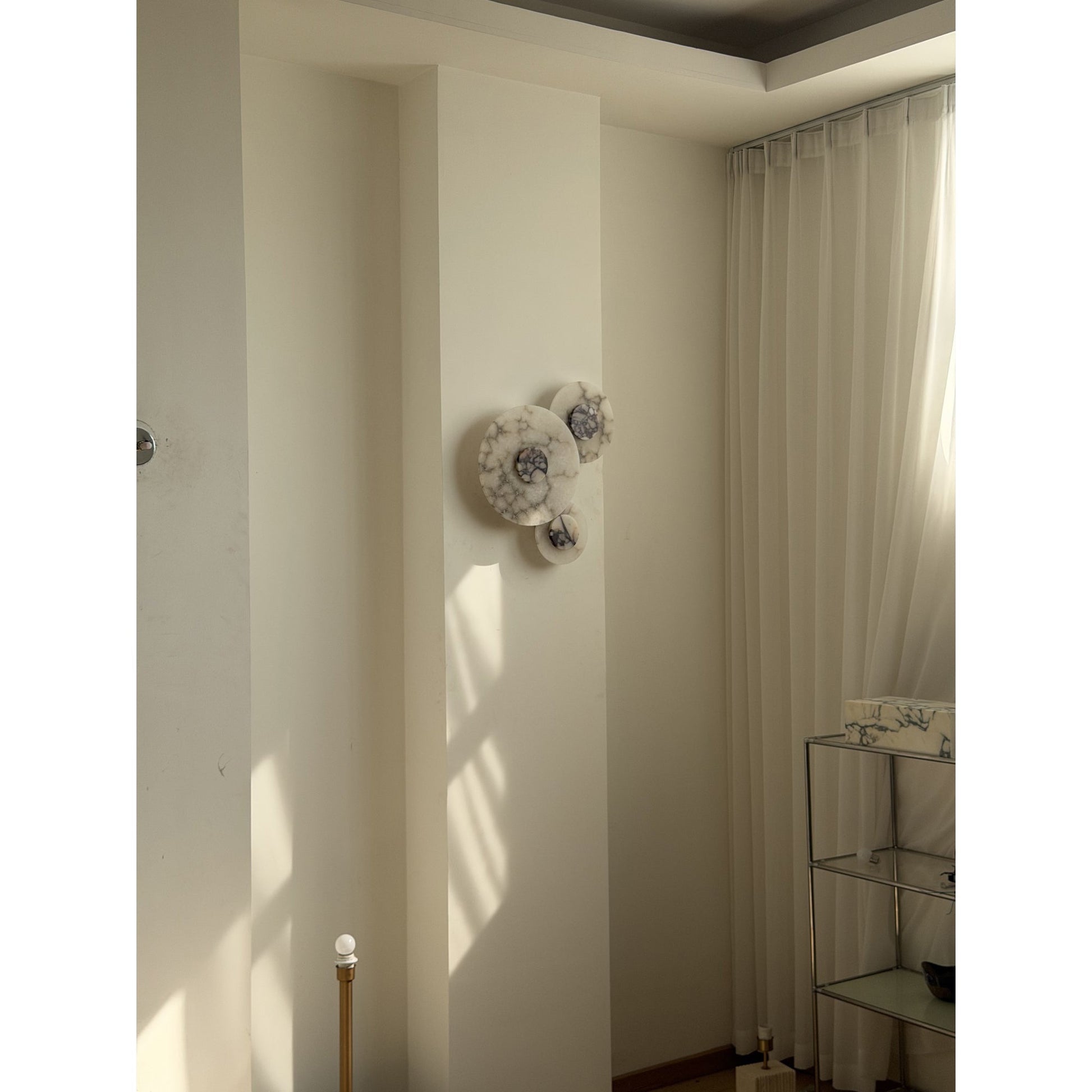 Installation detail of the Median Wall Lamp's mounting bracket.