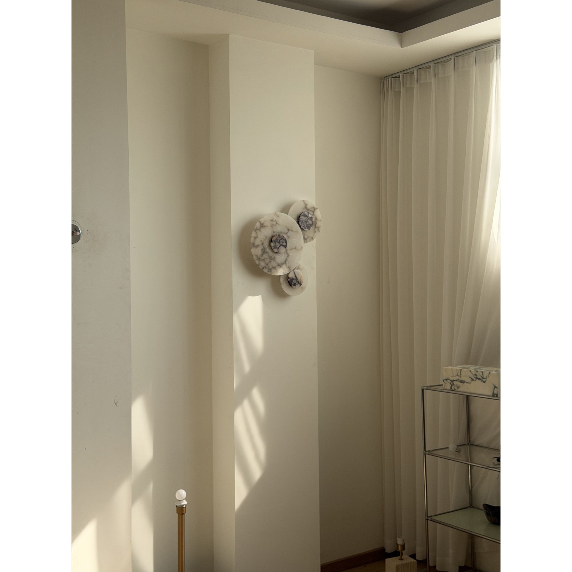 Installation detail of the Median Wall Lamp's mounting bracket.
