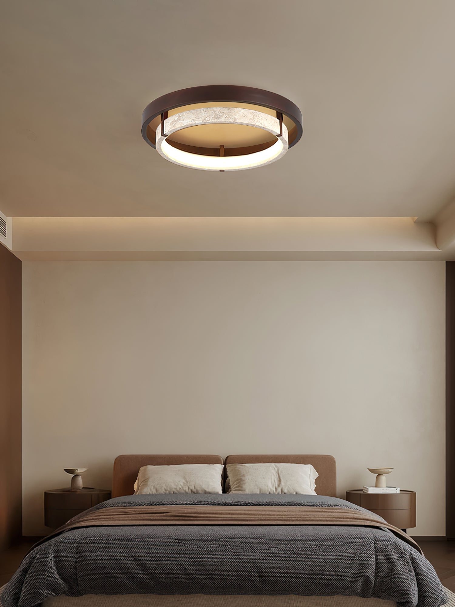 The Menine Ceiling Light providing a warm glow in a bedroom.