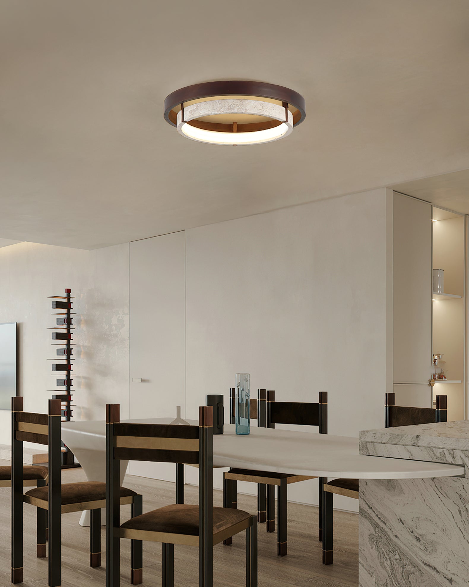 The circular ceiling light installed in a modern living room.