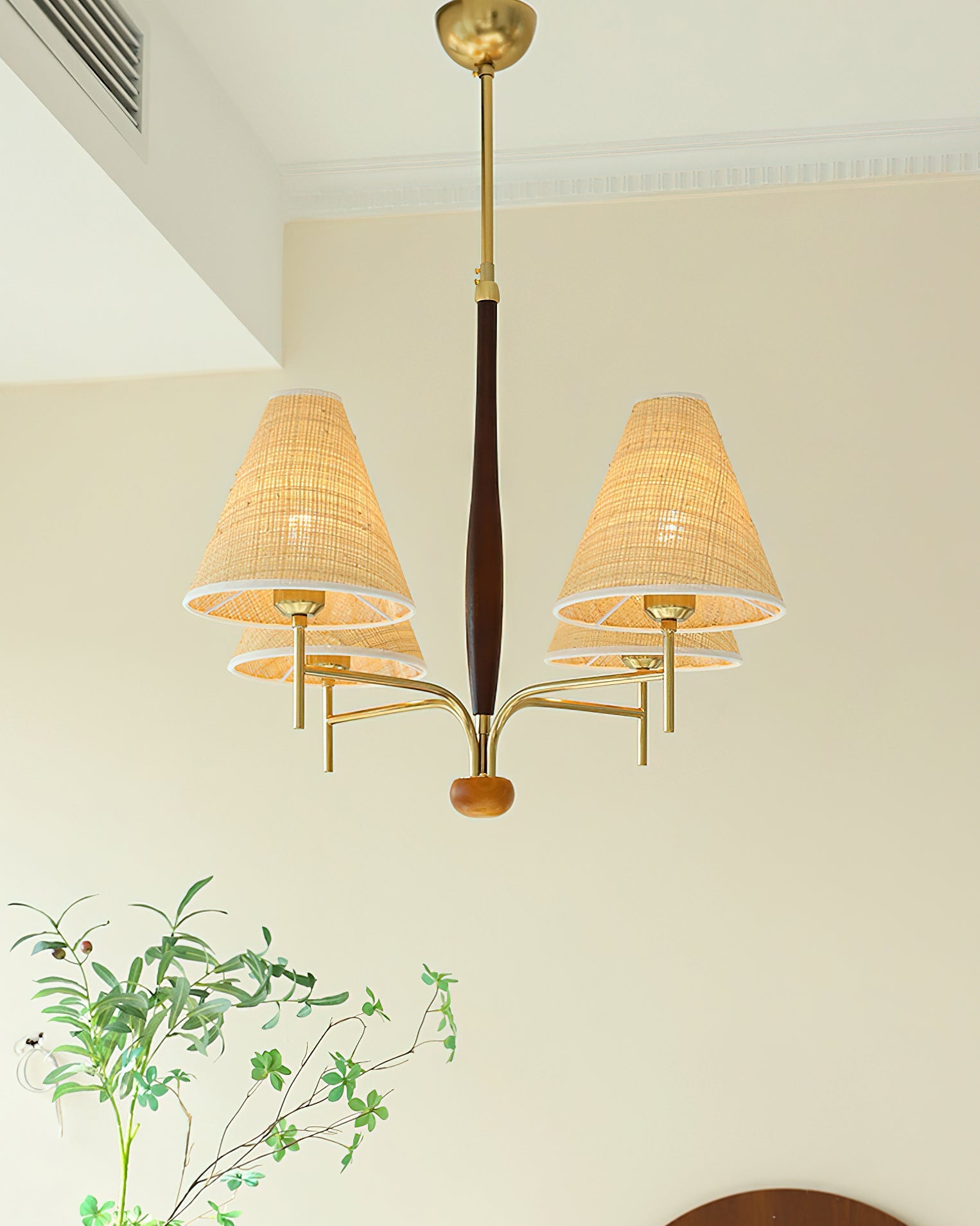 Close-up of a beige fabric shade on the Mercer Chandelier.