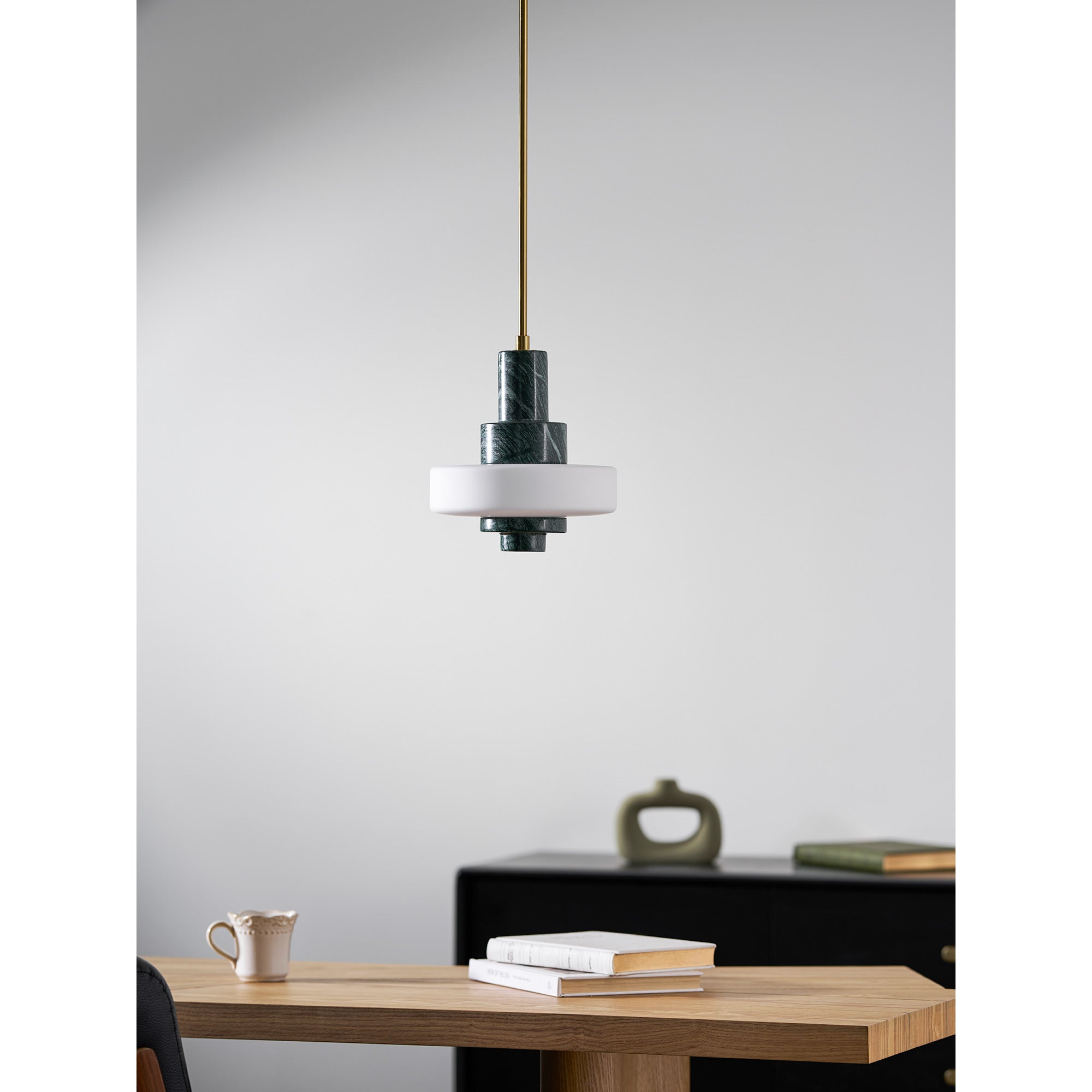 The green marble element of the lamp in natural light.