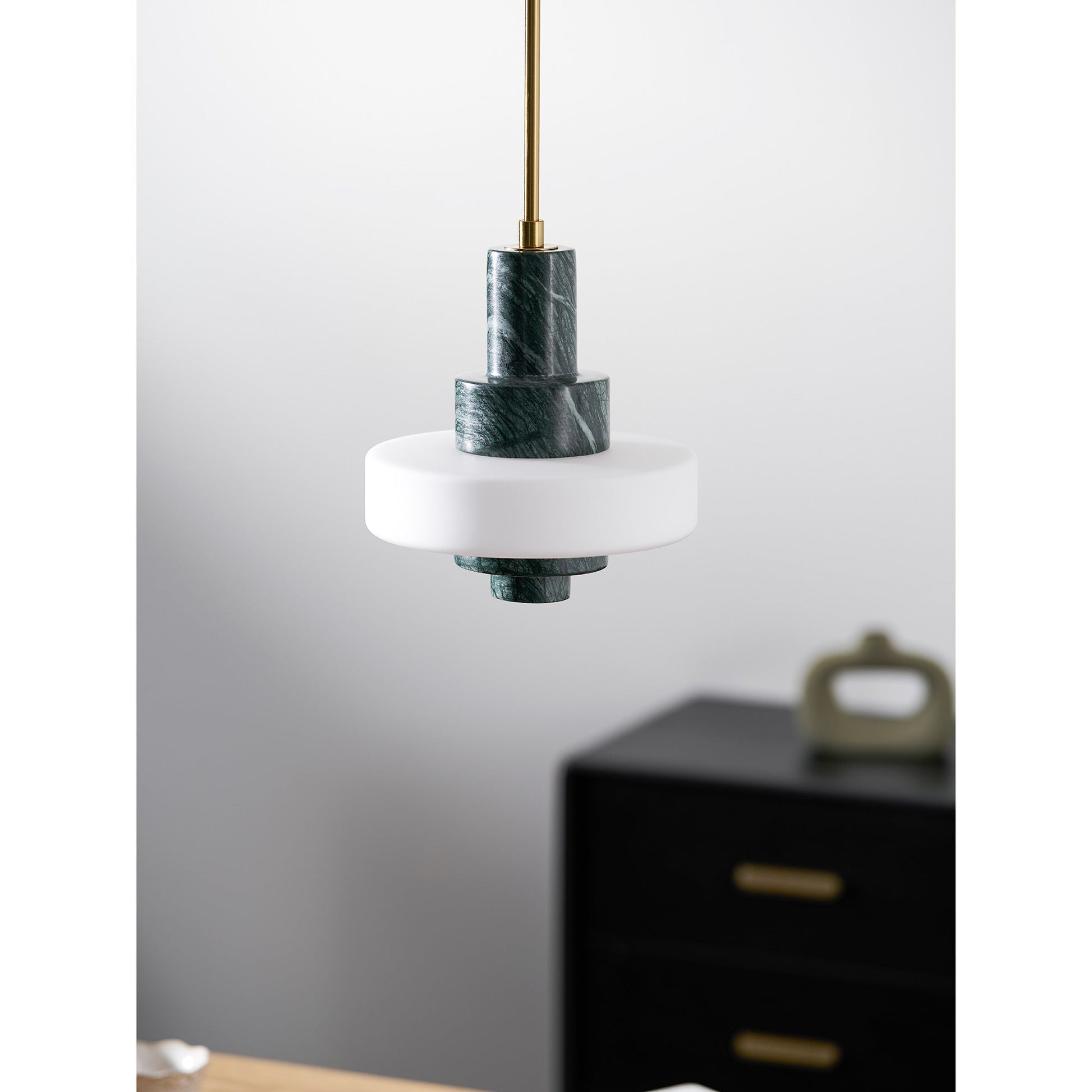 Another angle of the lamp over a set dining table.