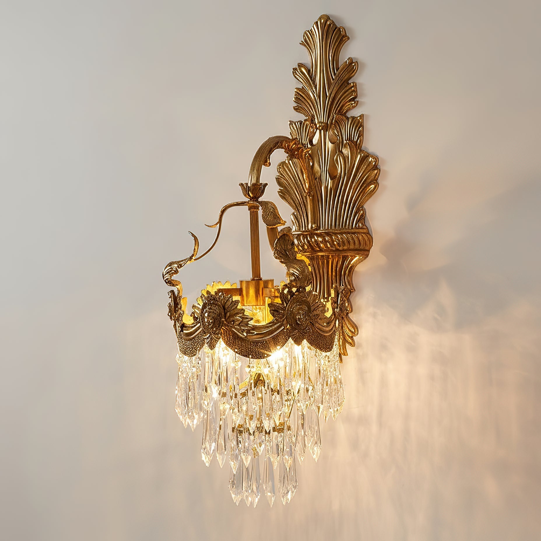 The lamp shown unlit to display the quality of the brass and crystal.