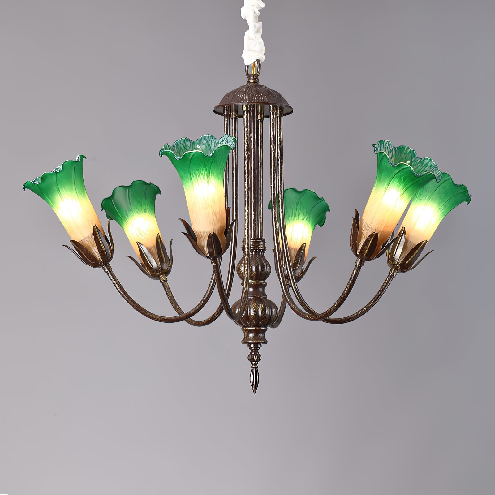 Meyda Chandelier hanging in a foyer, providing an upscale touch.
