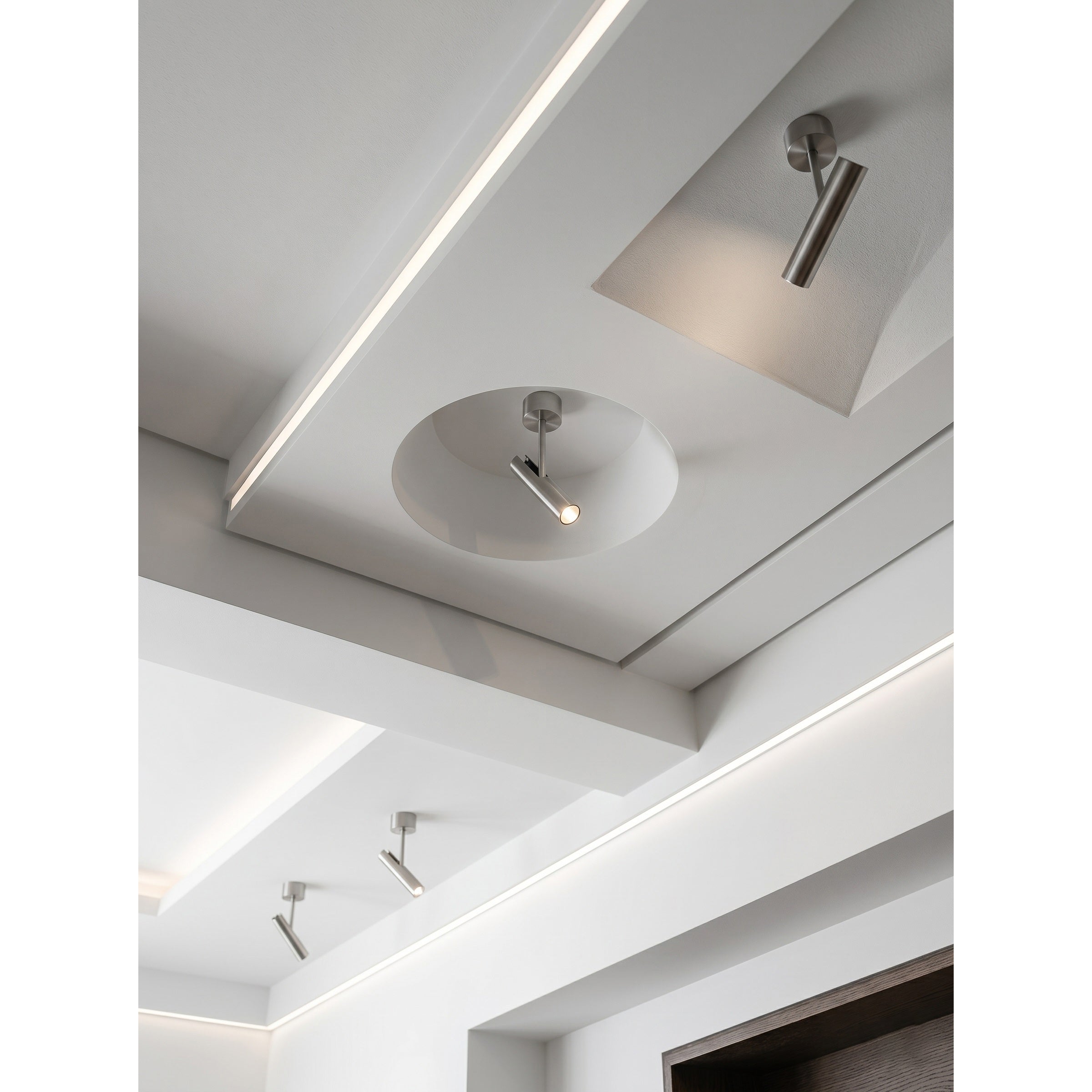 View from below showing the light beam of the spotlight.