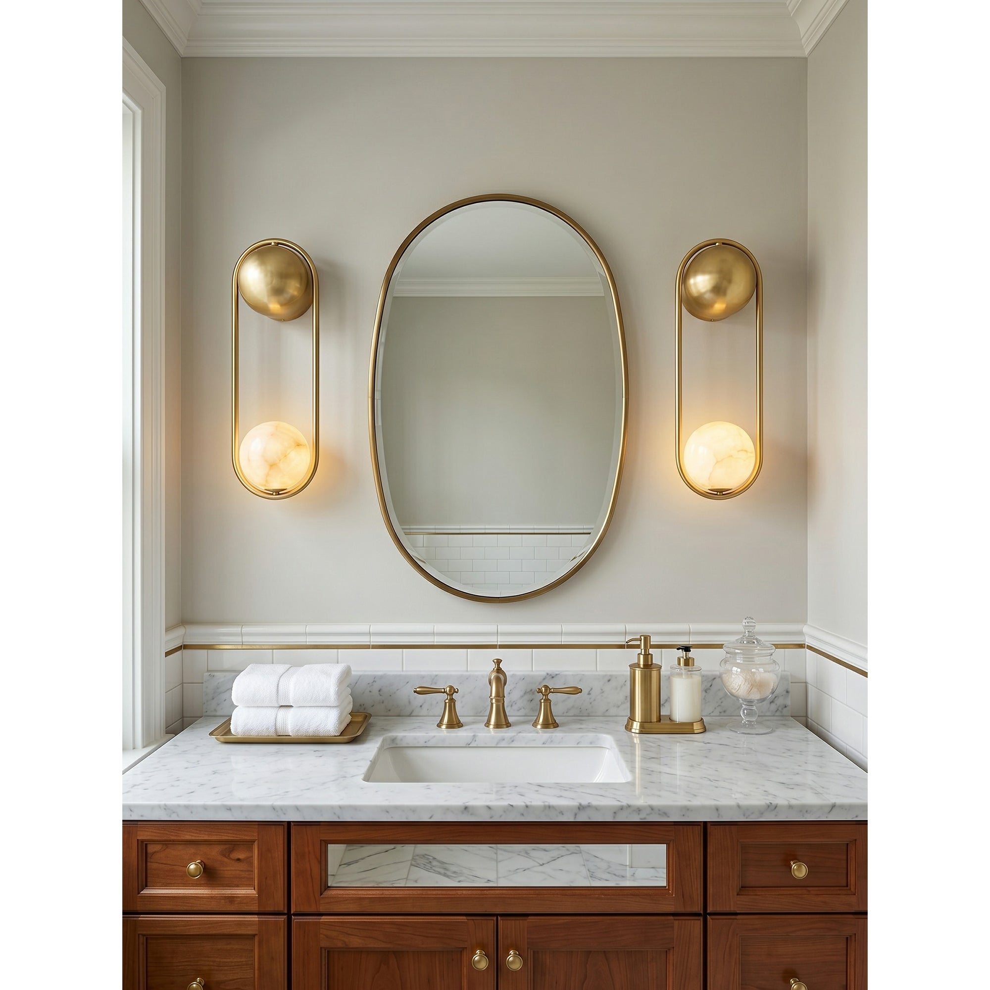 The sconce installed in a bathroom next to a mirror.