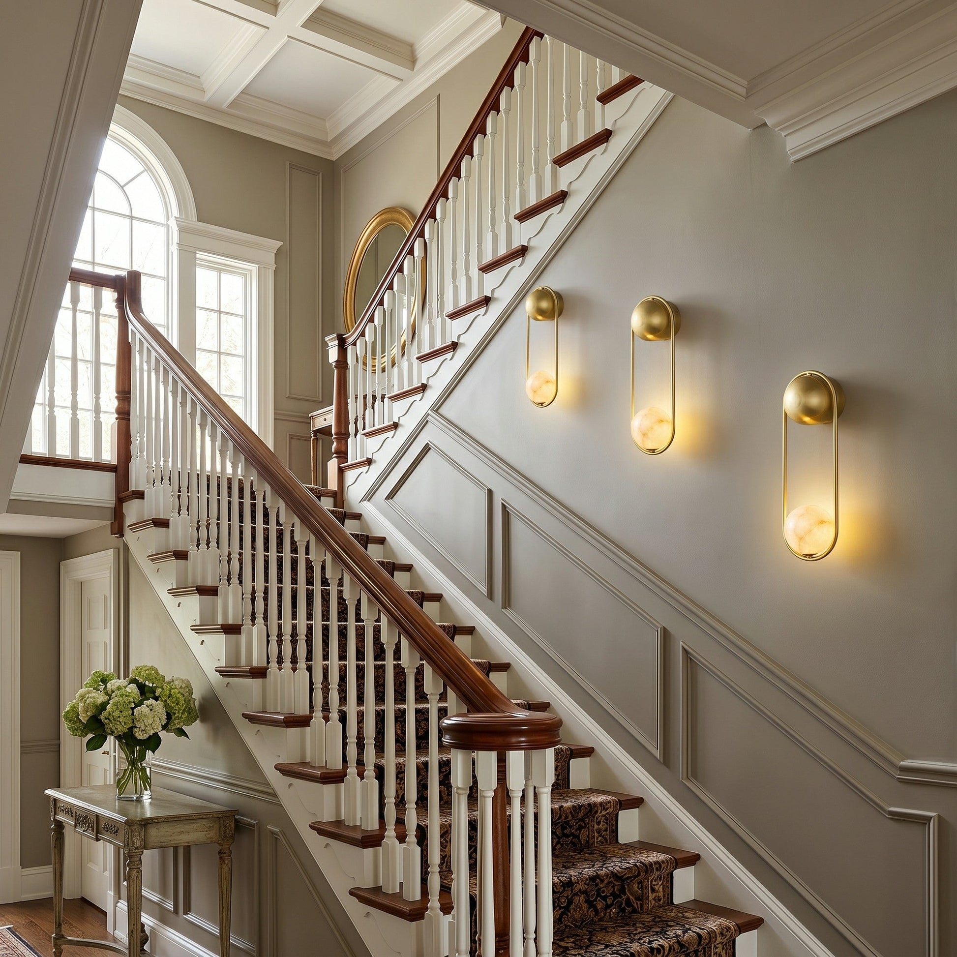 The sconce illuminated, casting a soft, warm glow on the wall.