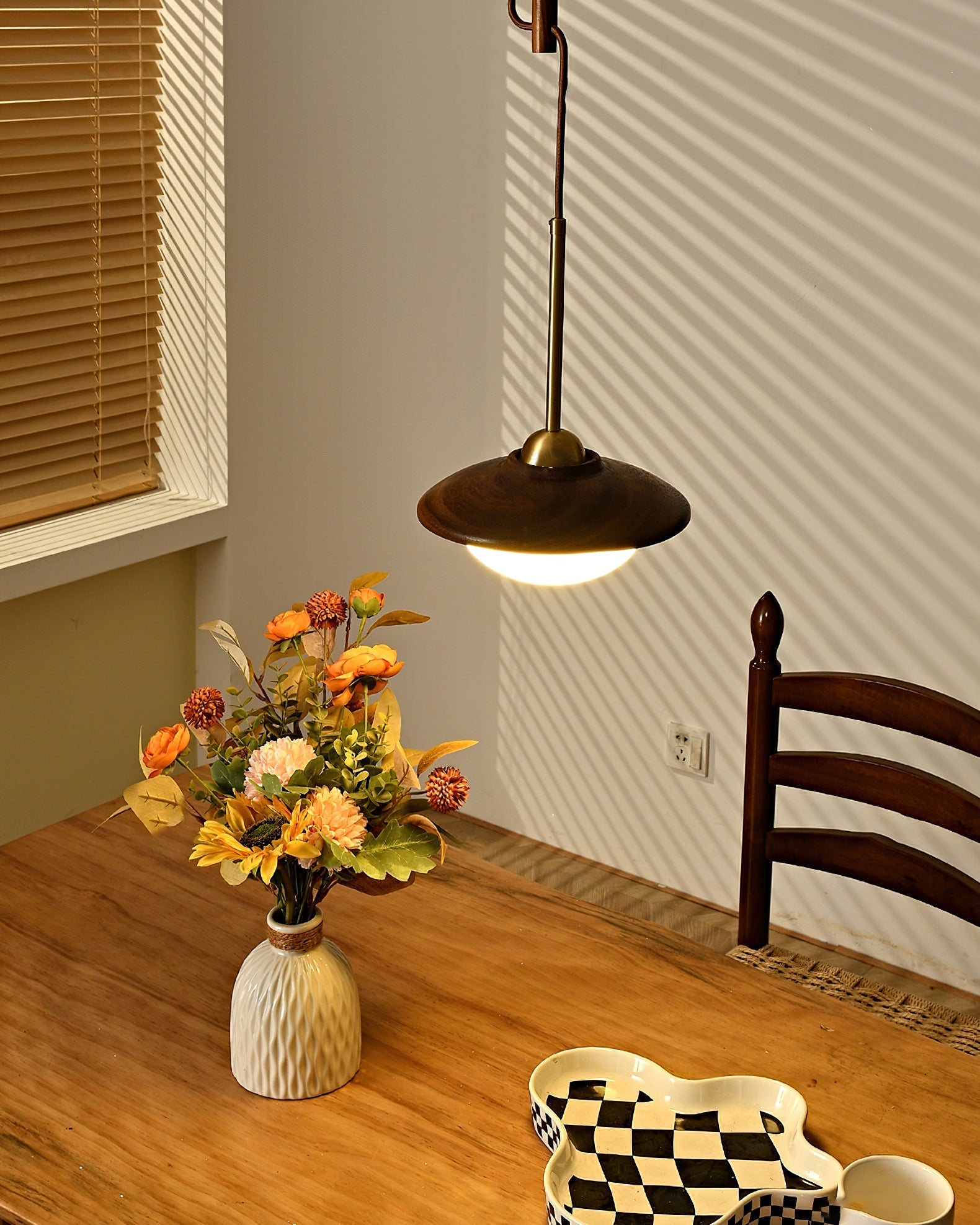 Angled shot of the single-globe Milivia Pendant Light.