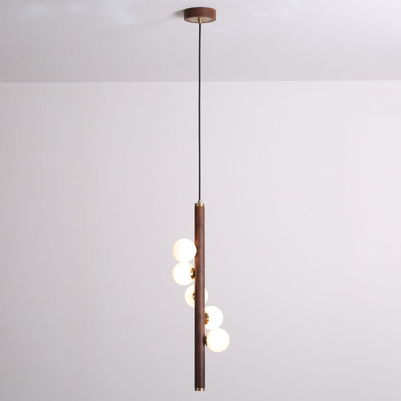 The light fixture hanging from the ceiling, showing the mounting.