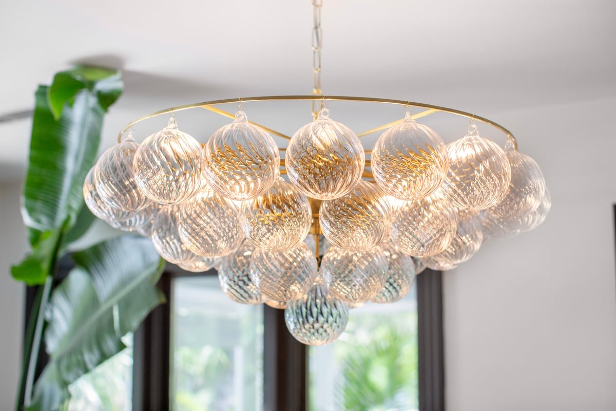 Aurora Chandelier Clear Glass Globe Aged Brass Elegant-Neutral Decor
