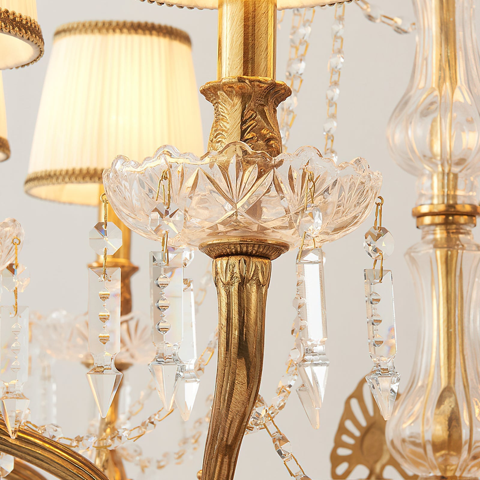 View from below, looking up at the illuminated chandelier.