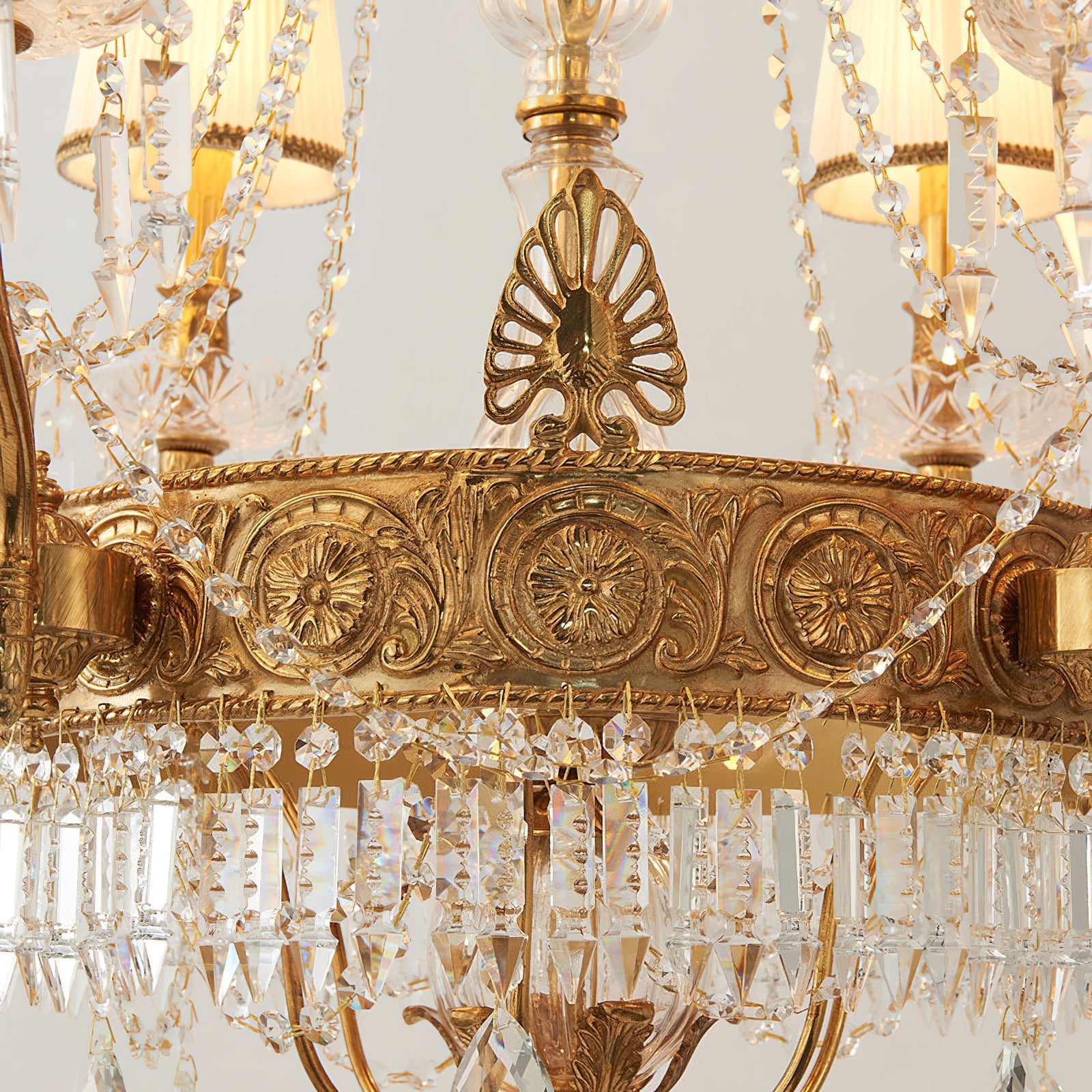 The chandelier's hanging chain and ceiling canopy.