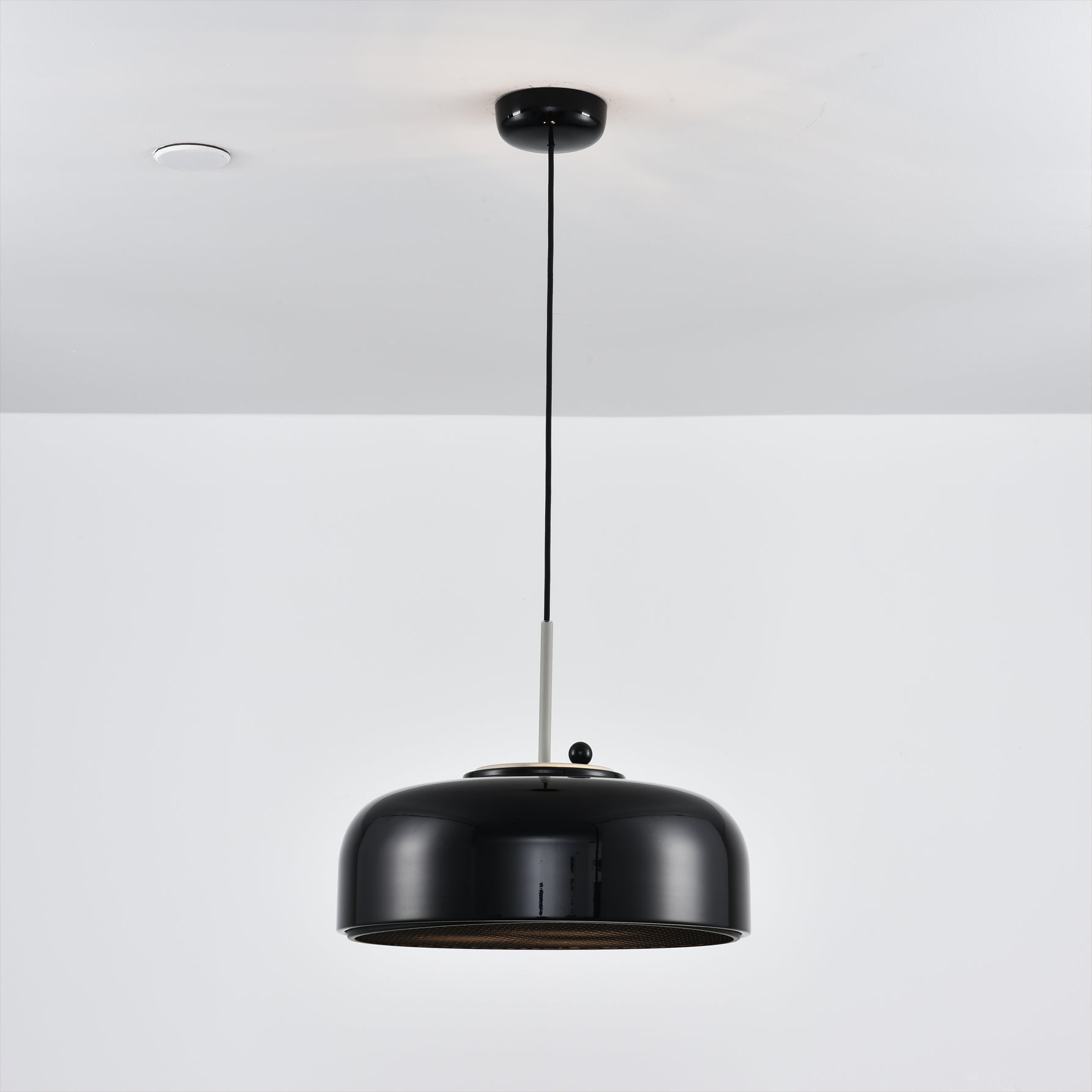 Misha Pendant Light in grey, hanging in a series.