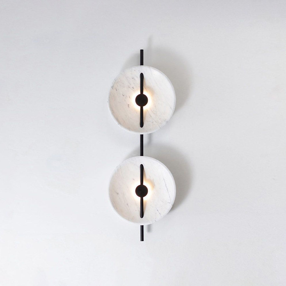 Close-up view of the Mito Marble Wall Lamp's marble and timber details.