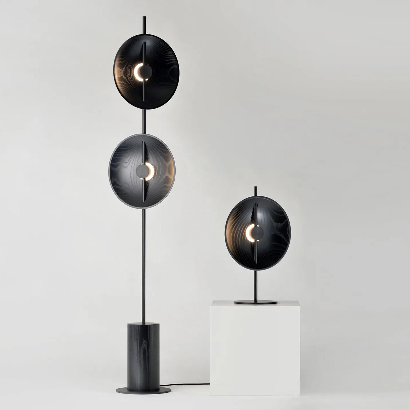 Side-by-side comparison of the Black and Wood color finishes.