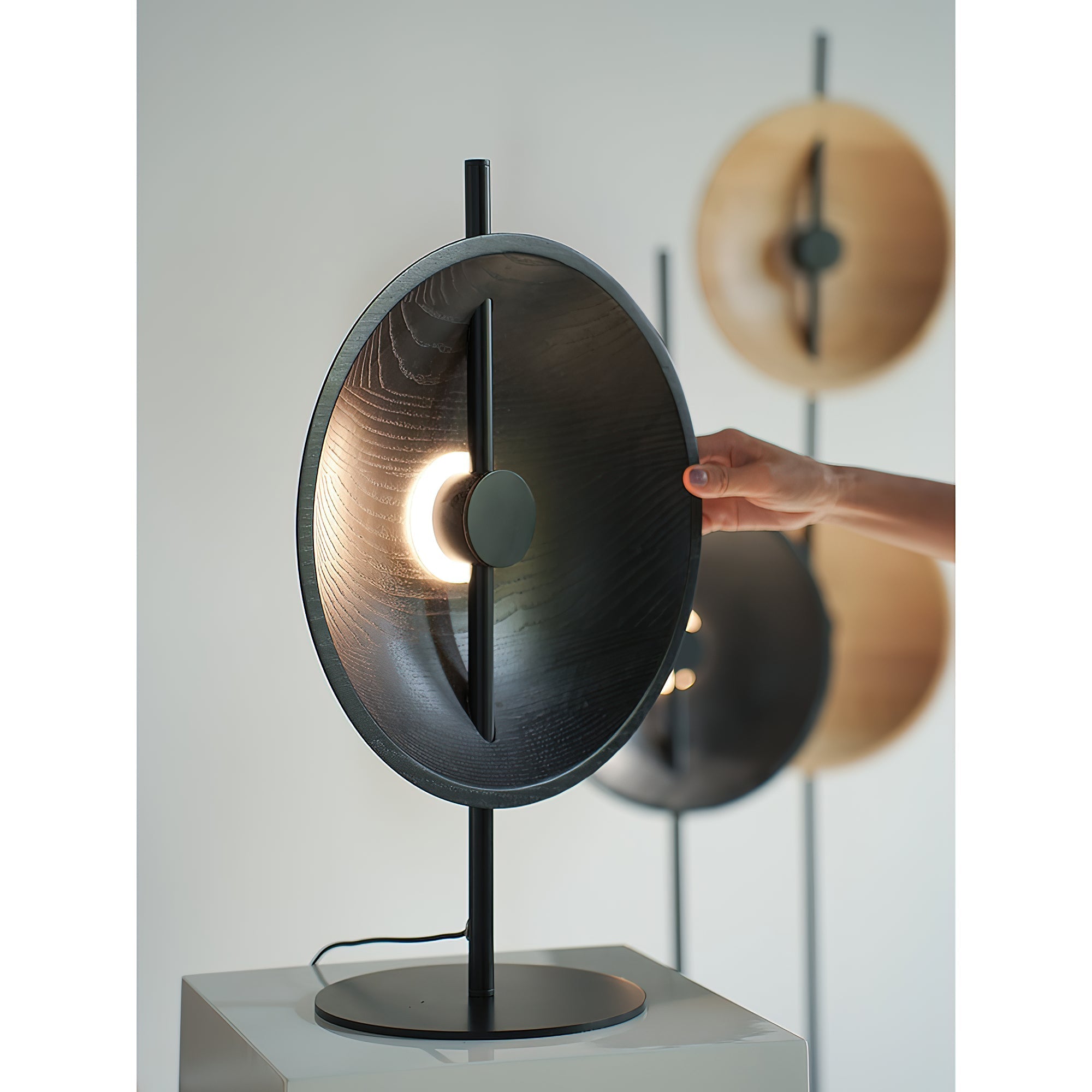 Angled view of the Mito Table Lamp highlighting its sleek profile.