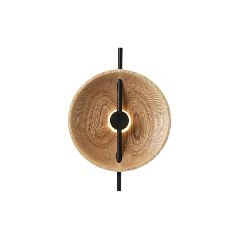 Mito Wall Lamp with black iron frame and wood shade against a plain background.