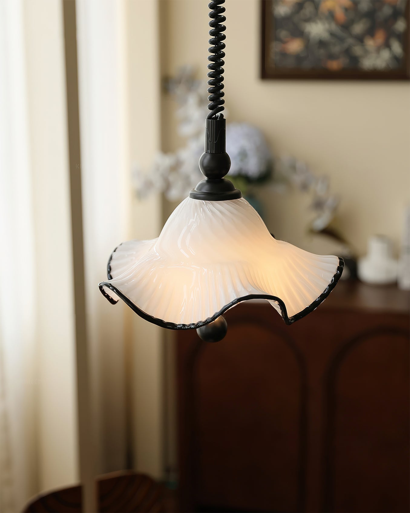 Mobo Pendant Light illuminated with a warm Edison bulb.