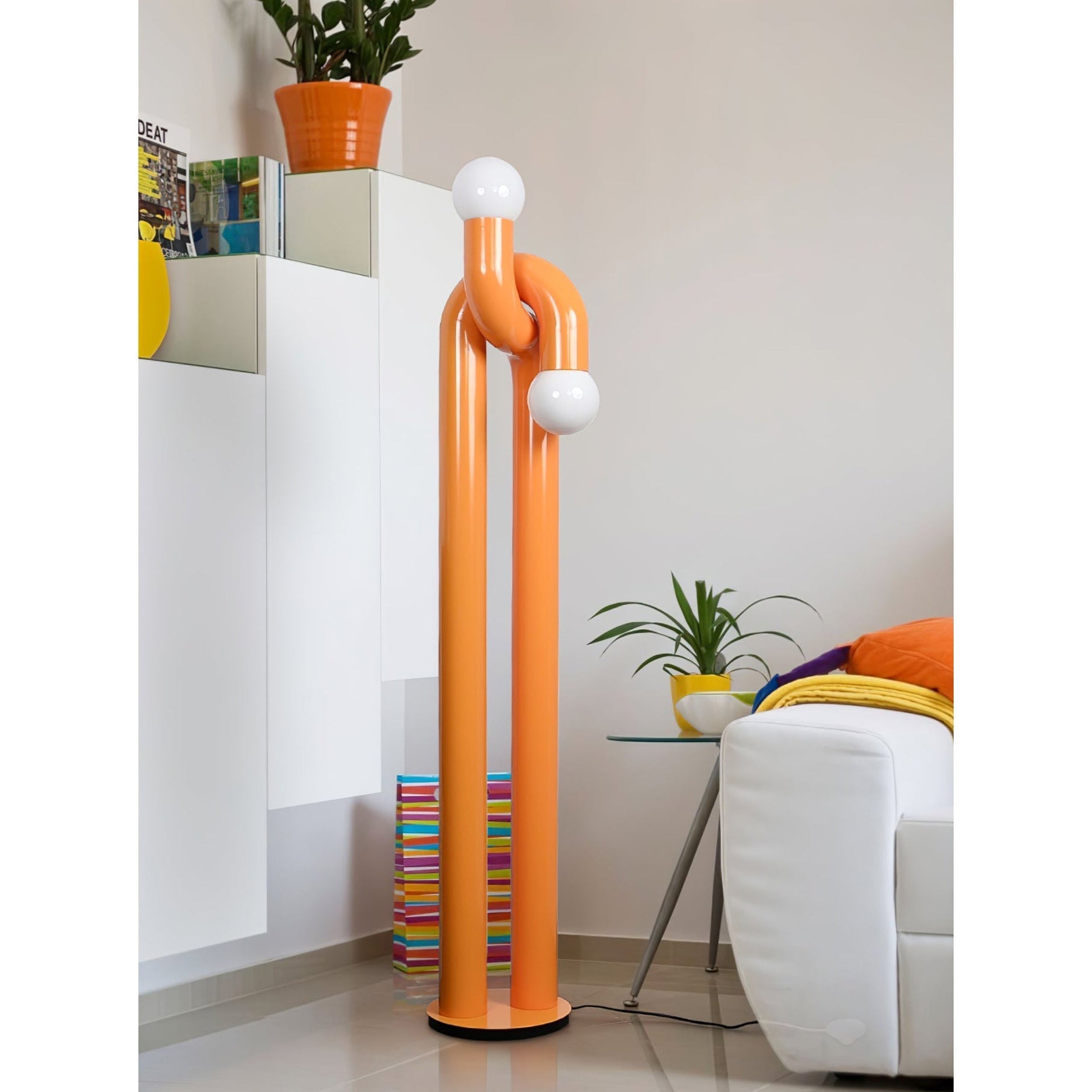 Angled view of the orange Modulation Floor Lamp, emphasizing its playful design.