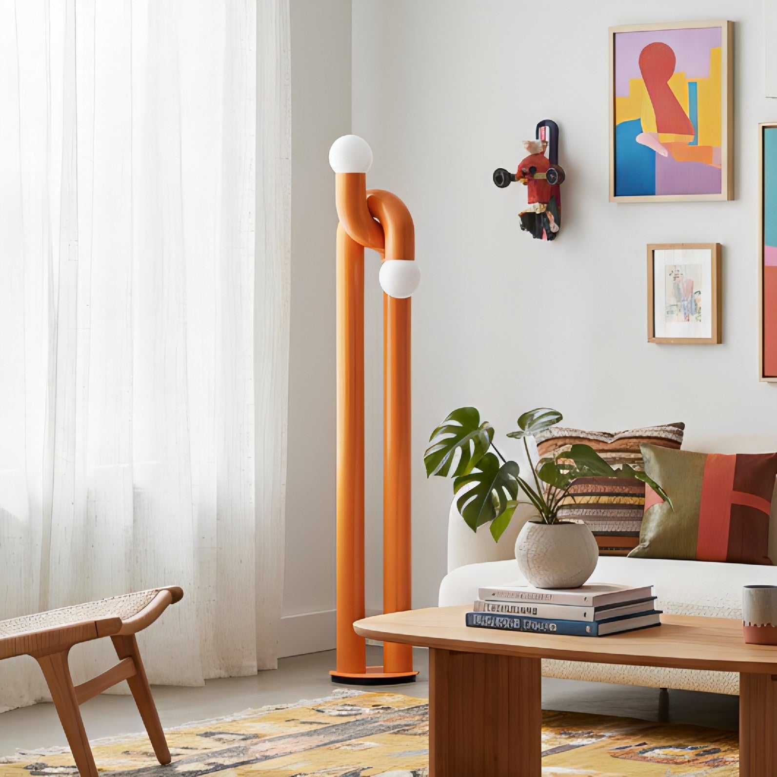 Modulation Floor Lamp in a crisp white finish against a dark wall.