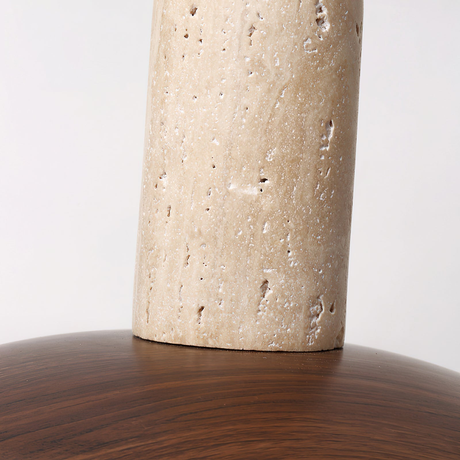 Top-down view showcasing the elegant travertine cap of the pendant.