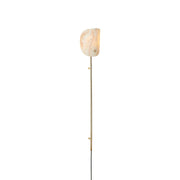 Monet Onyx Plug-In Sconce shown against a neutral wall.