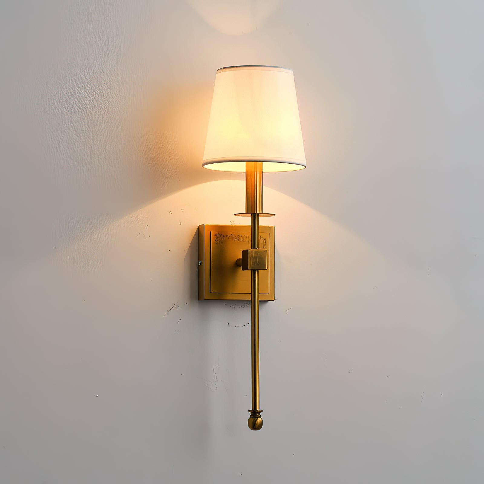 Lifestyle view of the Monroe Wall Lamp in a well-decorated living space.