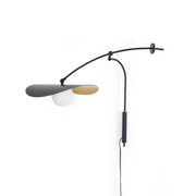 Myrna Plug-In Wall Lamp in black with glass shades.