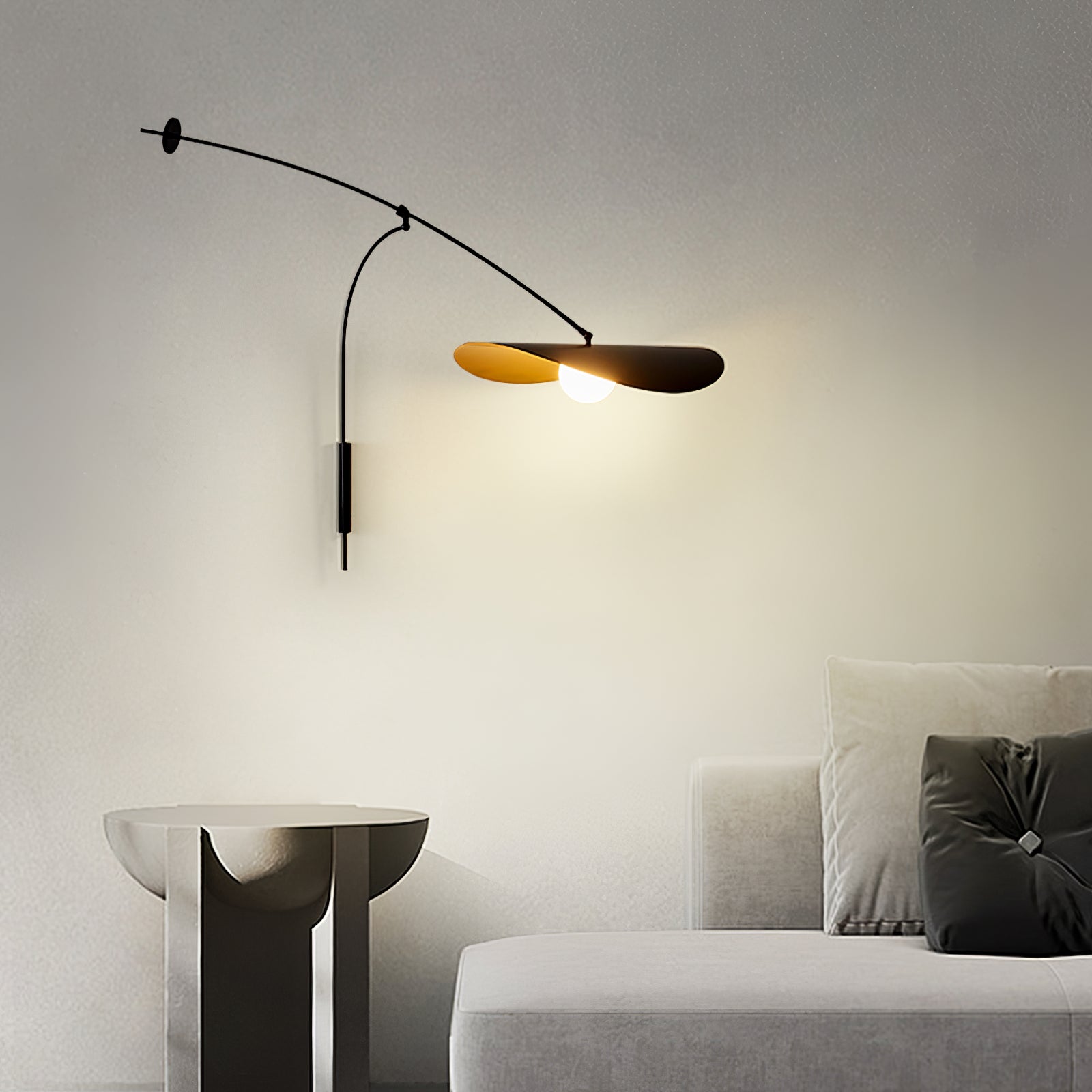 Lifestyle image featuring the Myrna Wall Lamp in a chic living room.