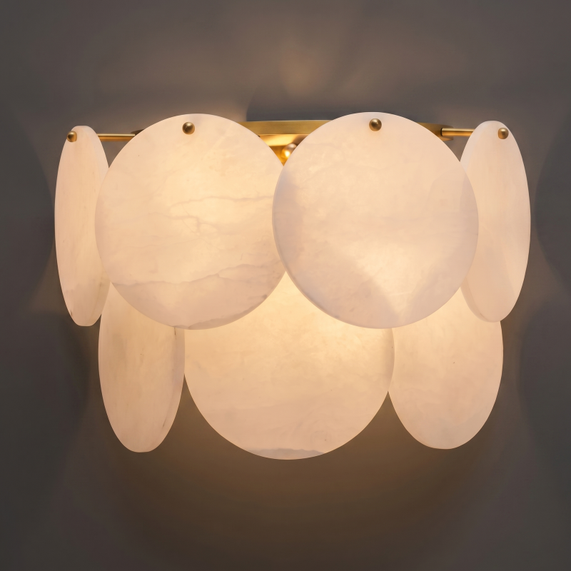 The warm, ambient glow emitted through the translucent alabaster stone.