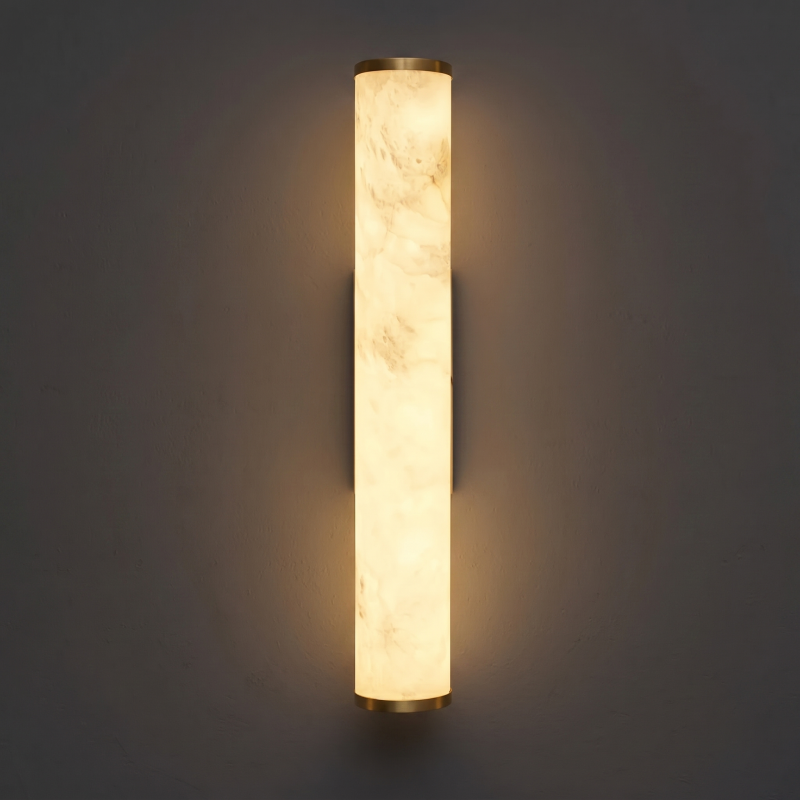 Stacked disc alabaster sconce with brass connectors.